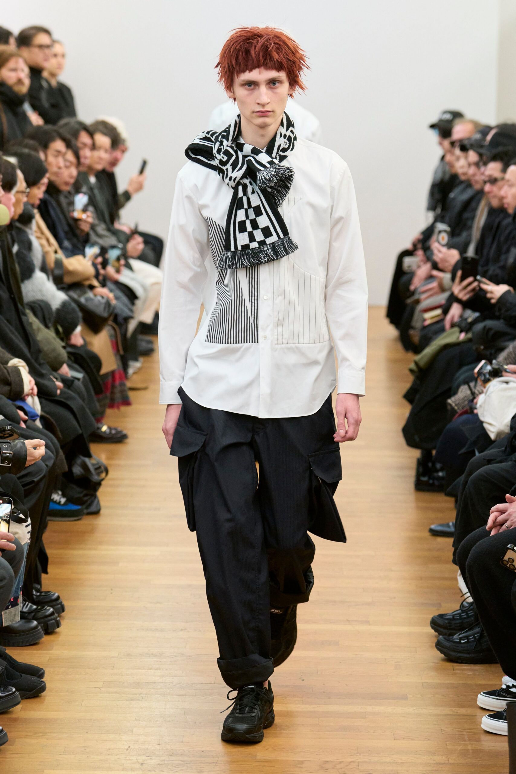 white relaxed shirt with black cargo pants
