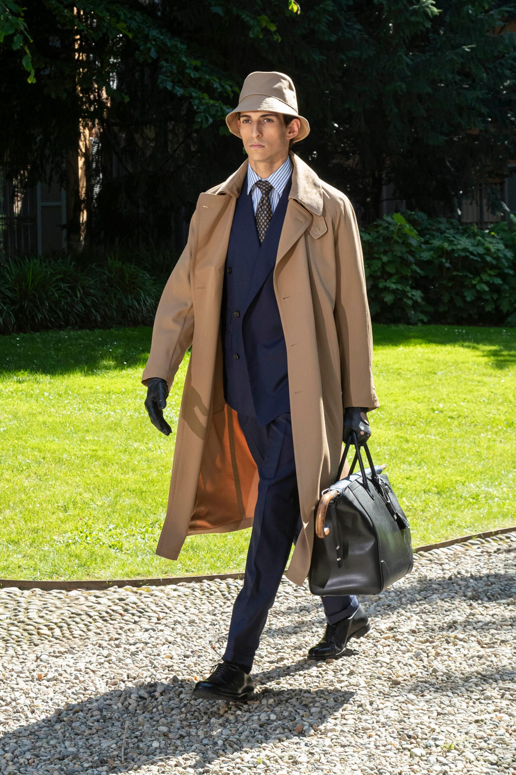 beige coat navy suit white shirt