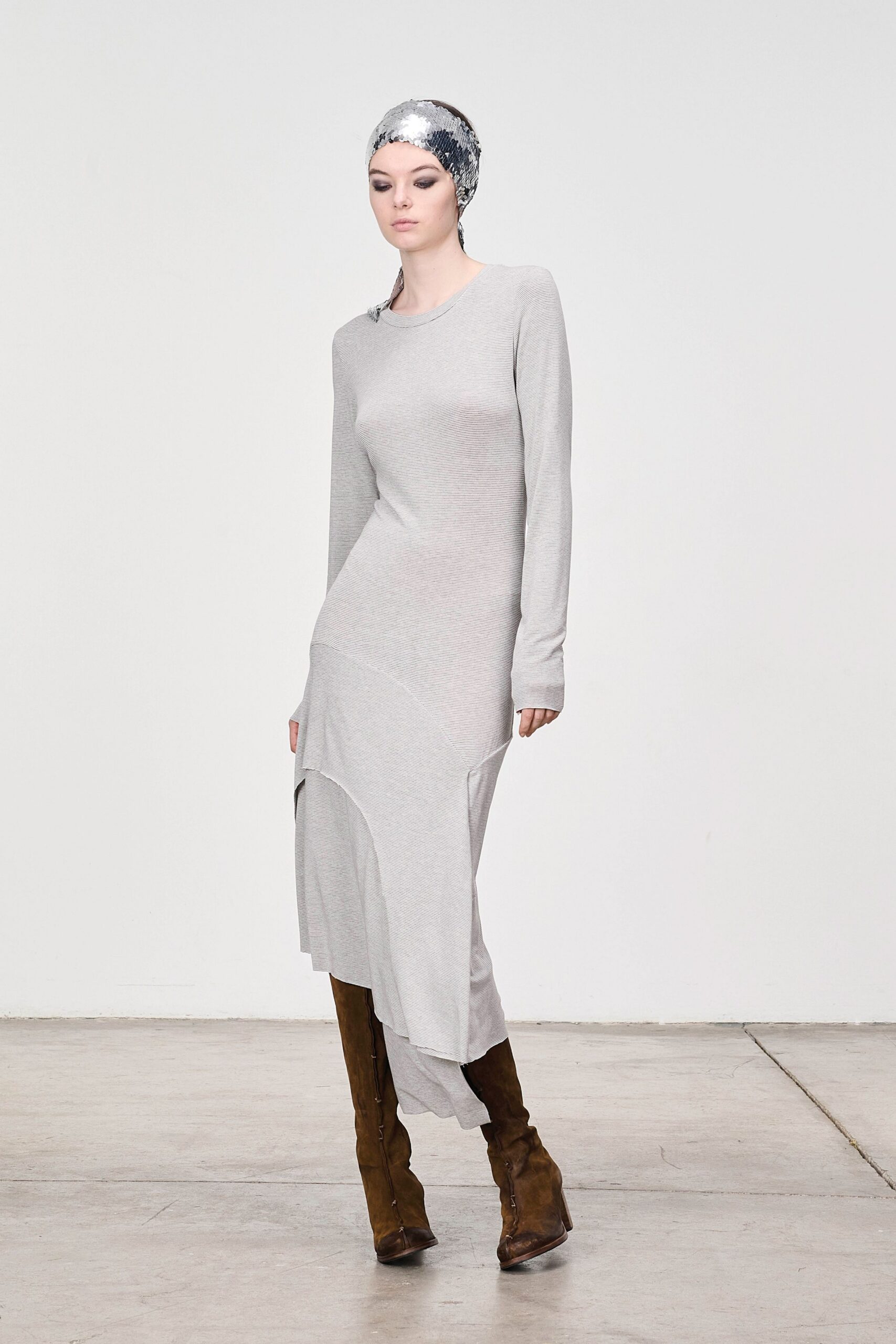 gray asymmetric midi dress with brown boots