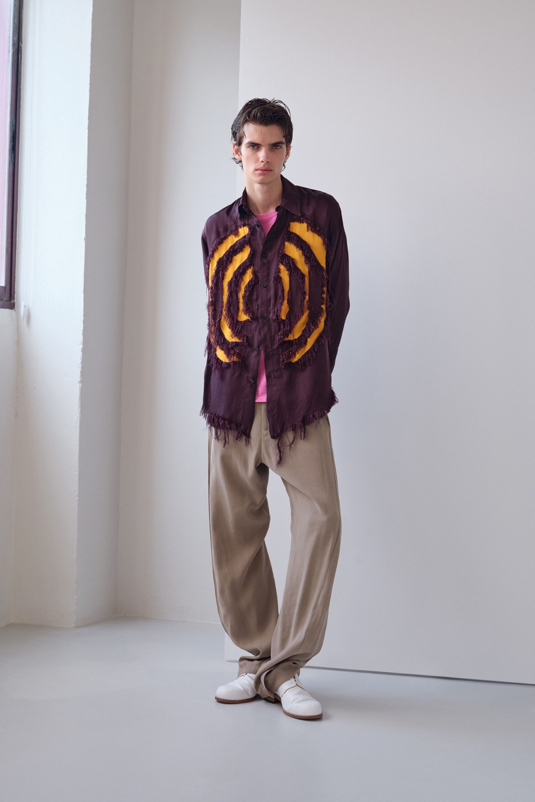 purple fringed shirt with pink t-shirt