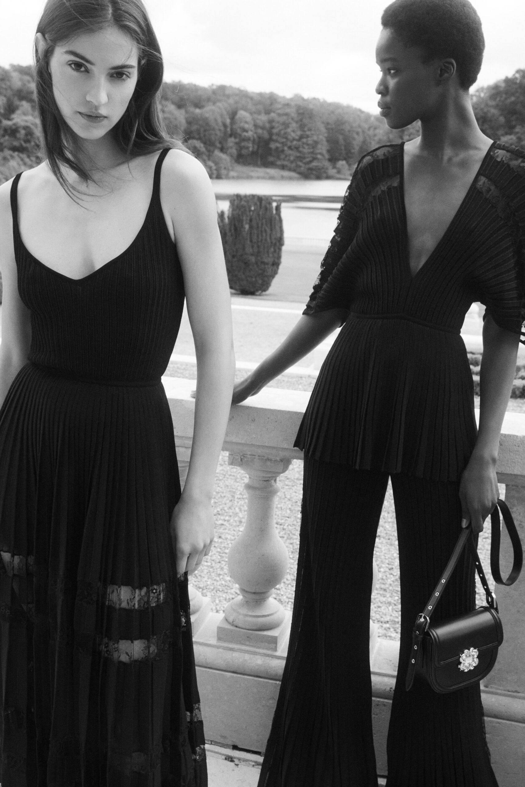 black pleated dress and jumpsuit