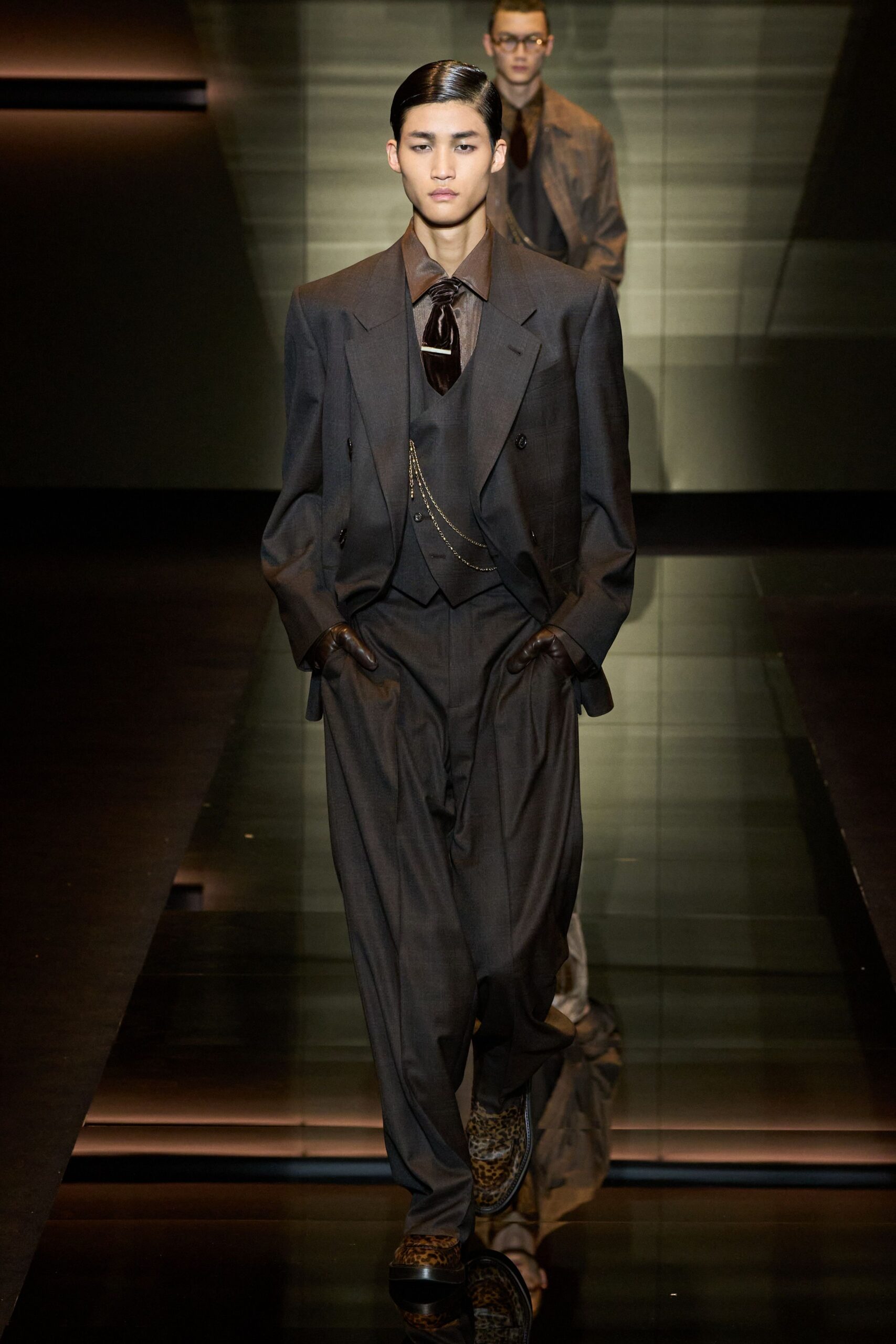 brown tailored suit with sunglasses