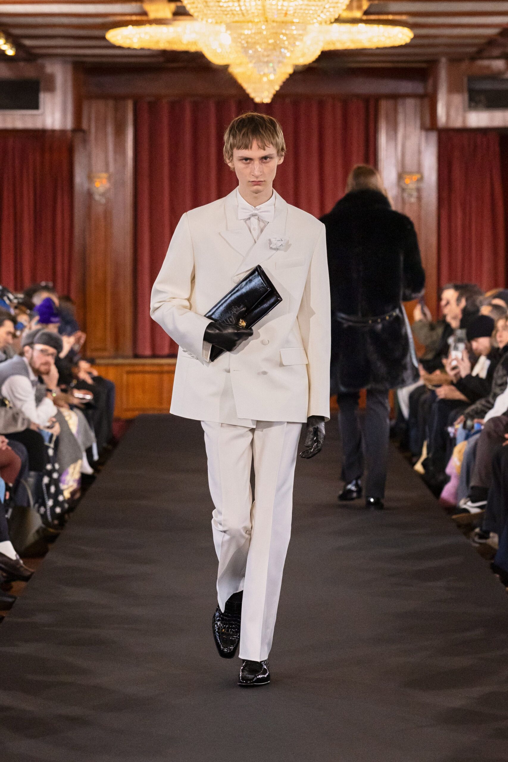 white tailored suit with black accessories