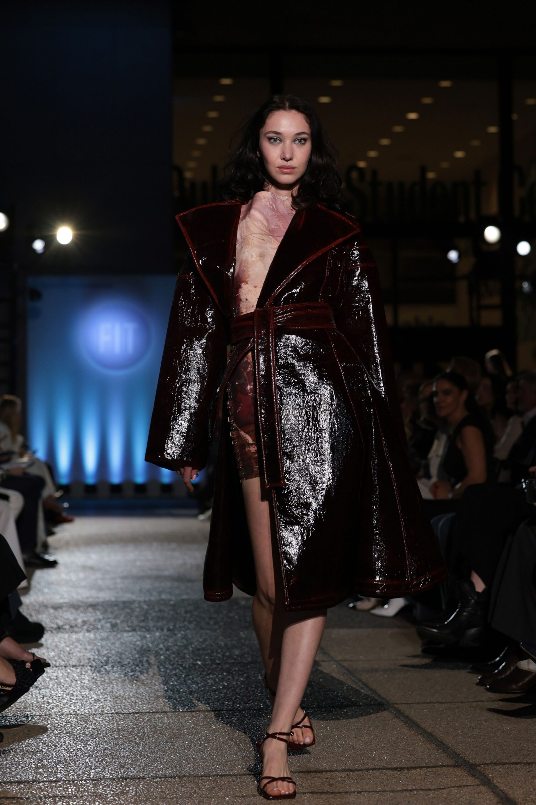 red vinyl long-sleeve collared fitted belted shiny coat