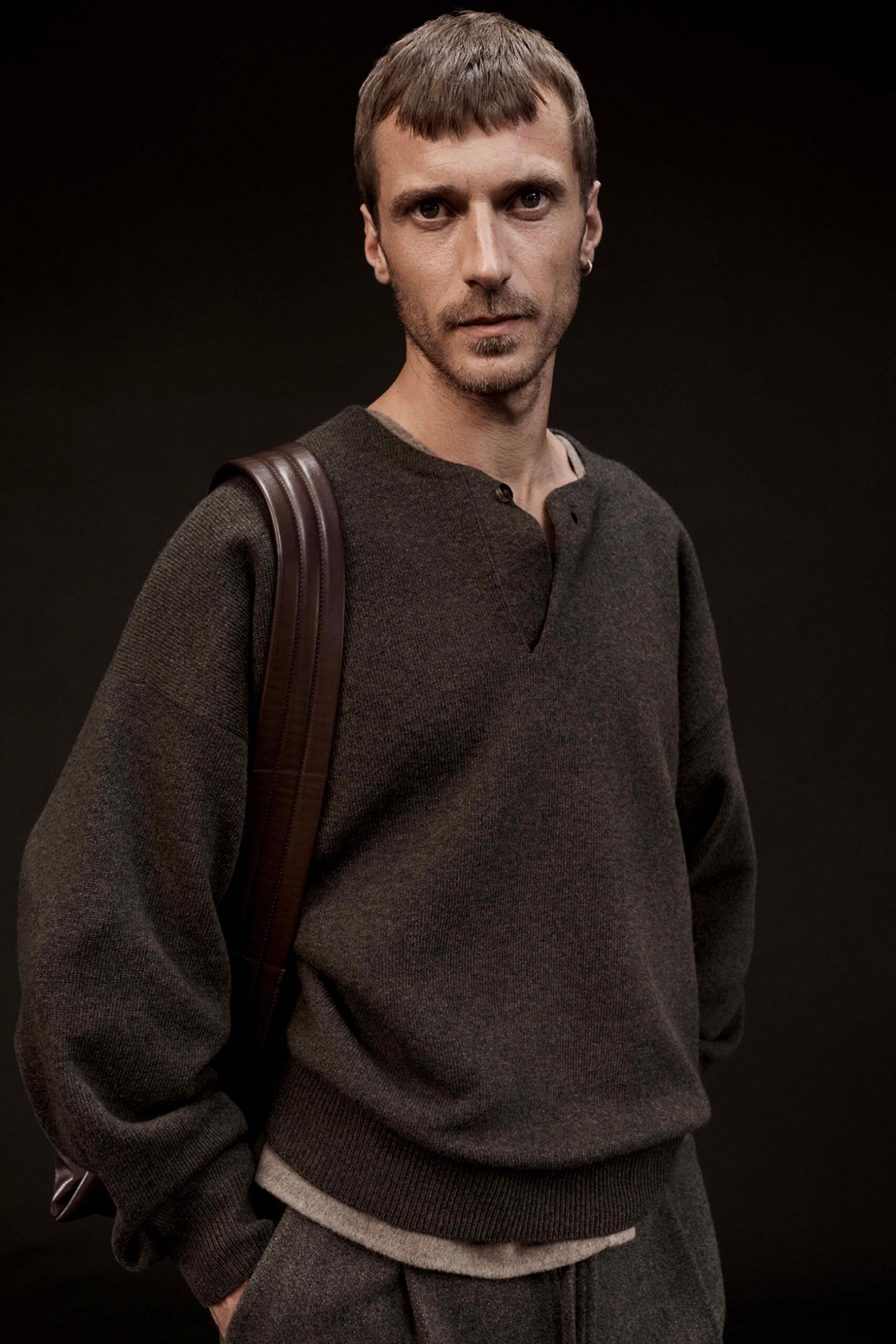 brown wool relaxed sweater with gray pants