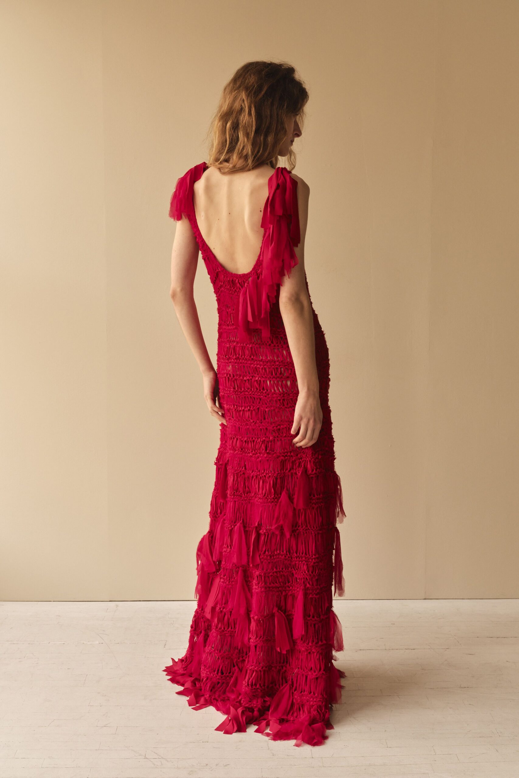 fitted red fringed gown