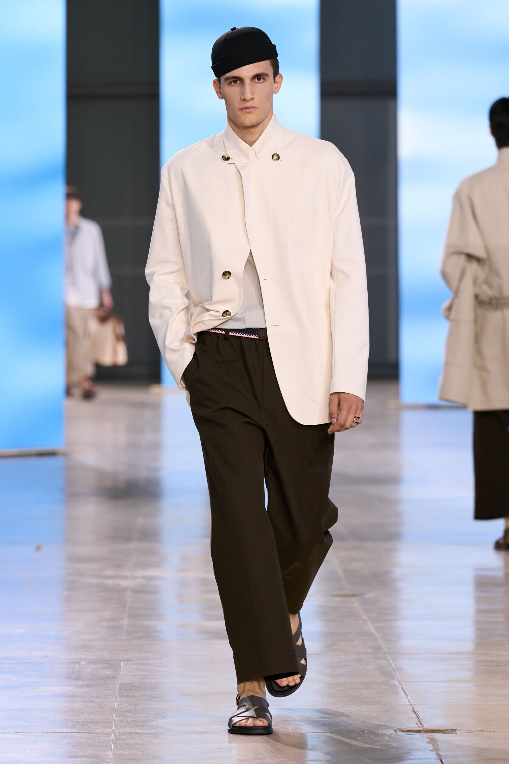white relaxed jacket with brown pants