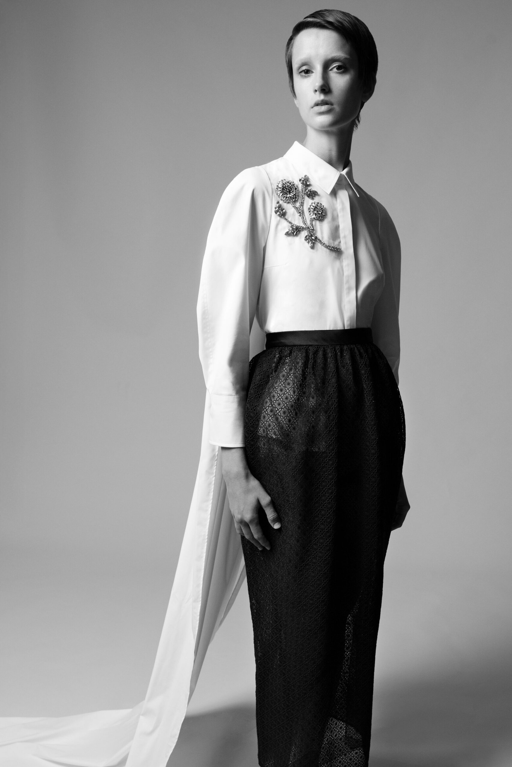 white fitted shirt with black skirt
