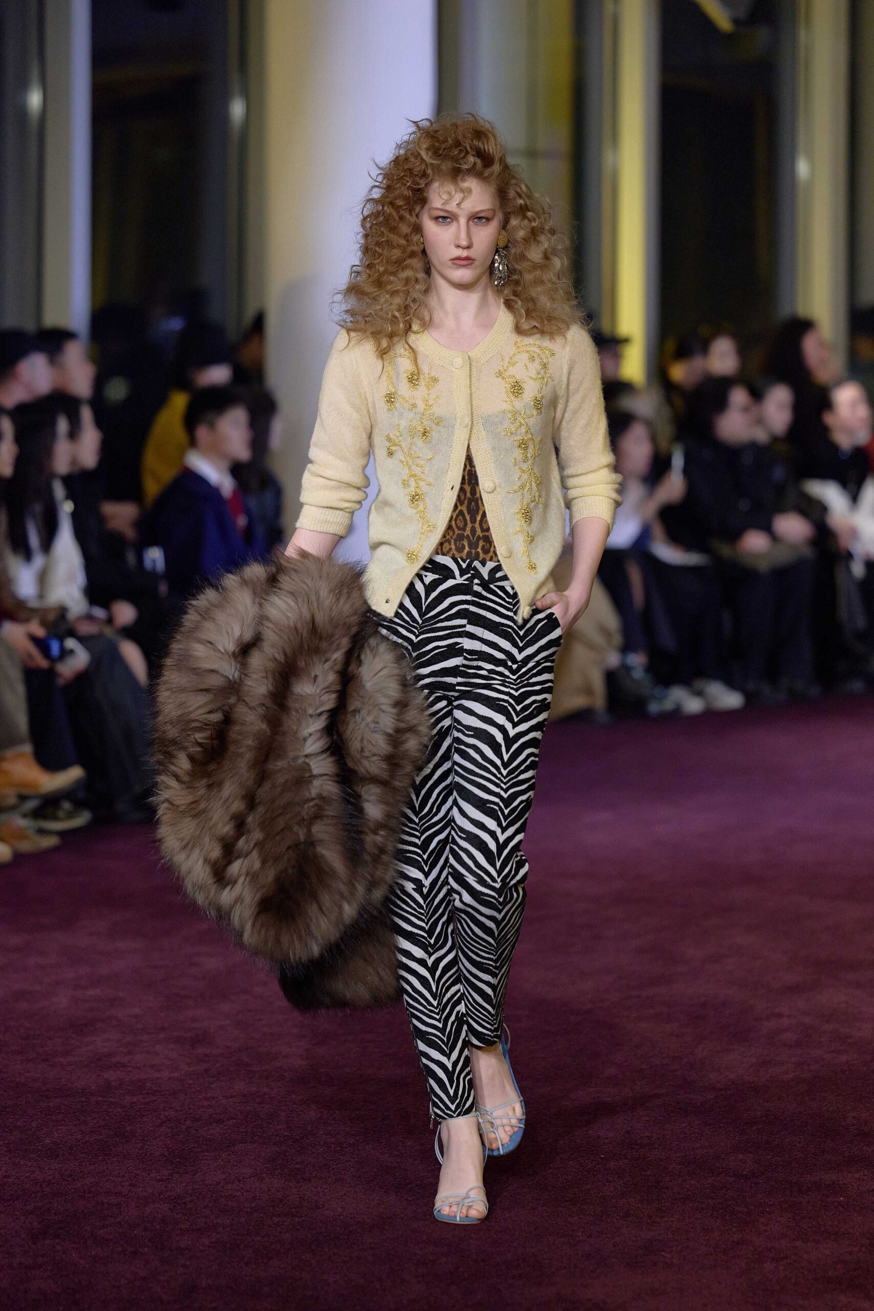 beige wool cardigan with animal-print pants