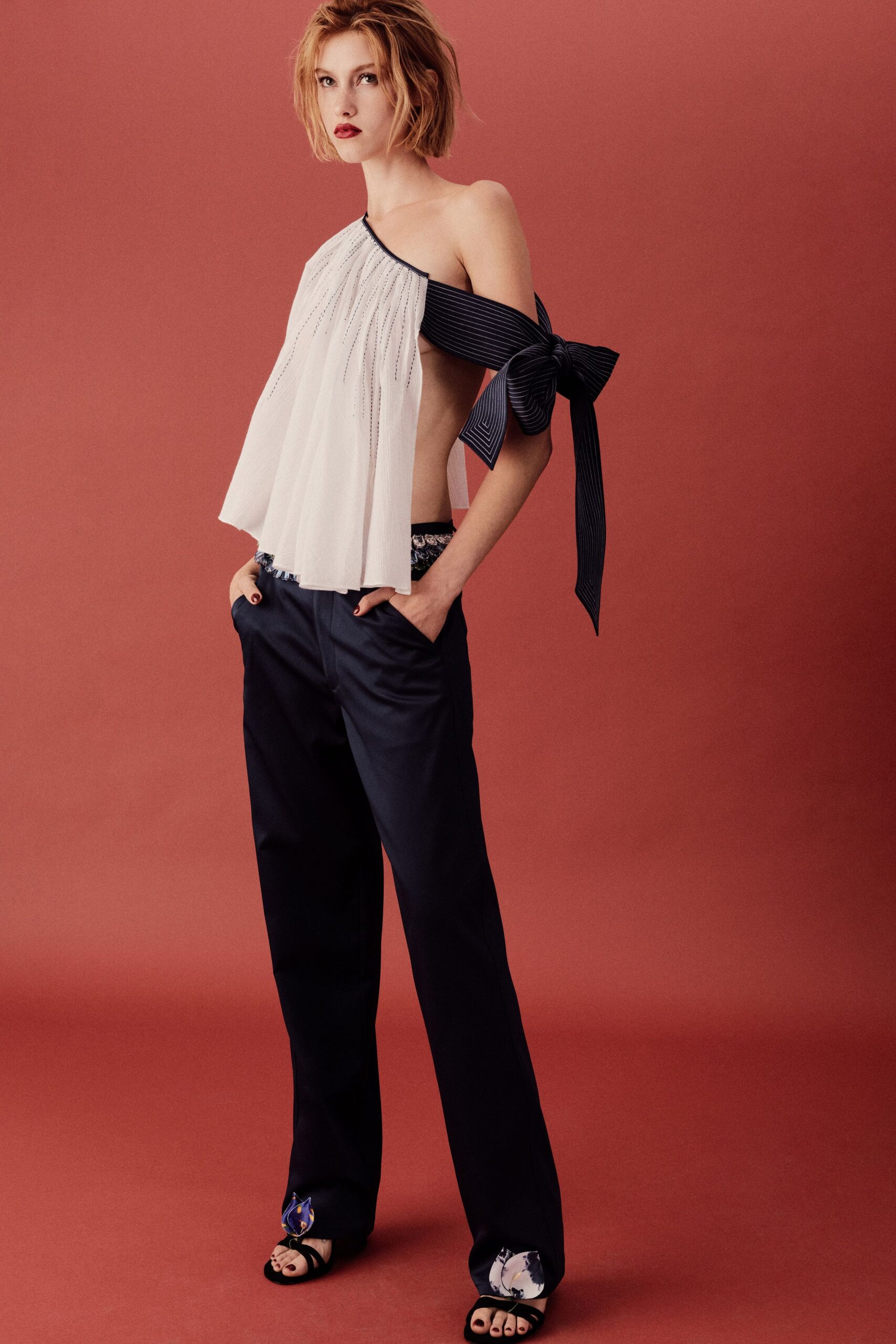 white silk sleeveless off-shoulder relaxed pleated top