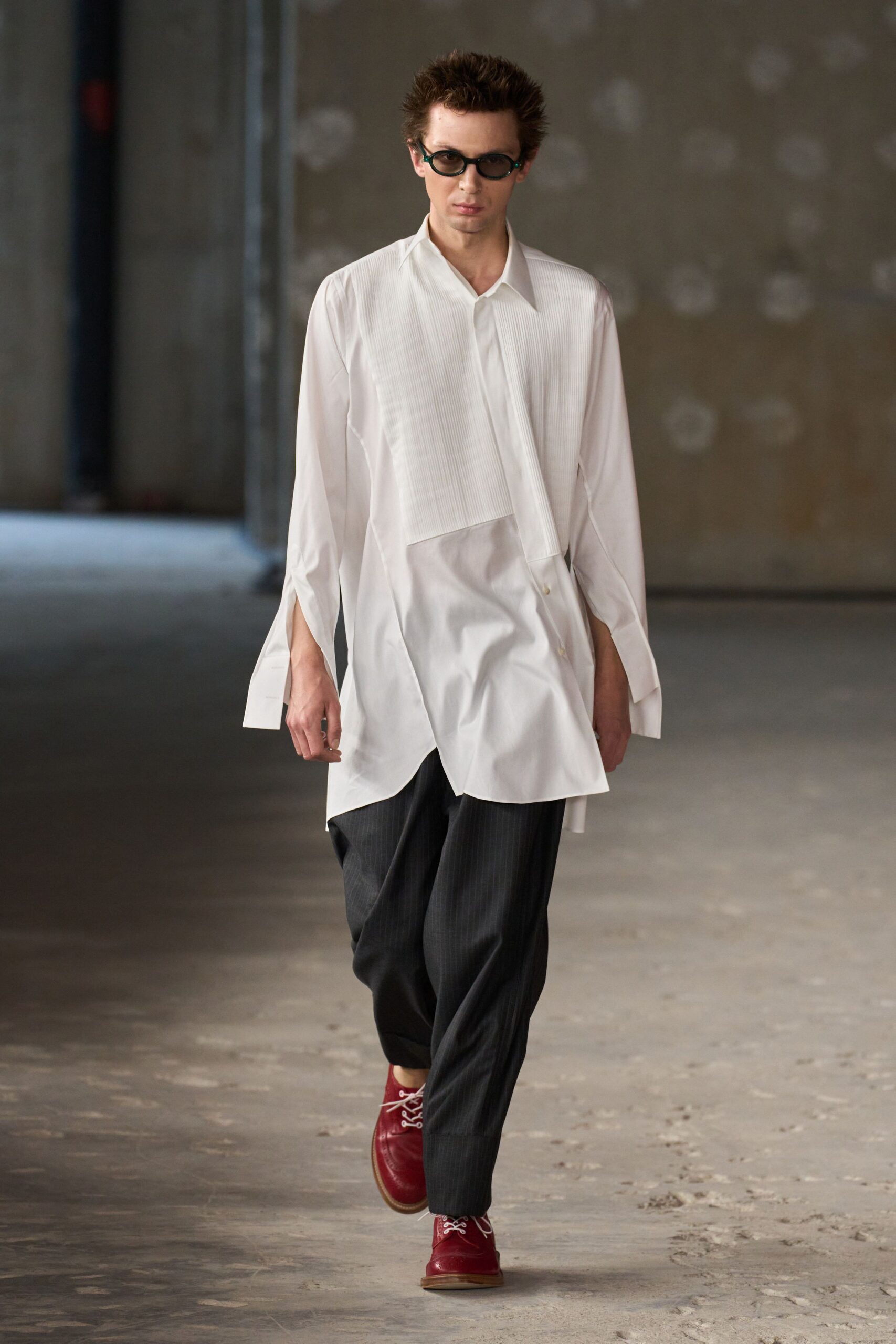 white relaxed shirt with black pants