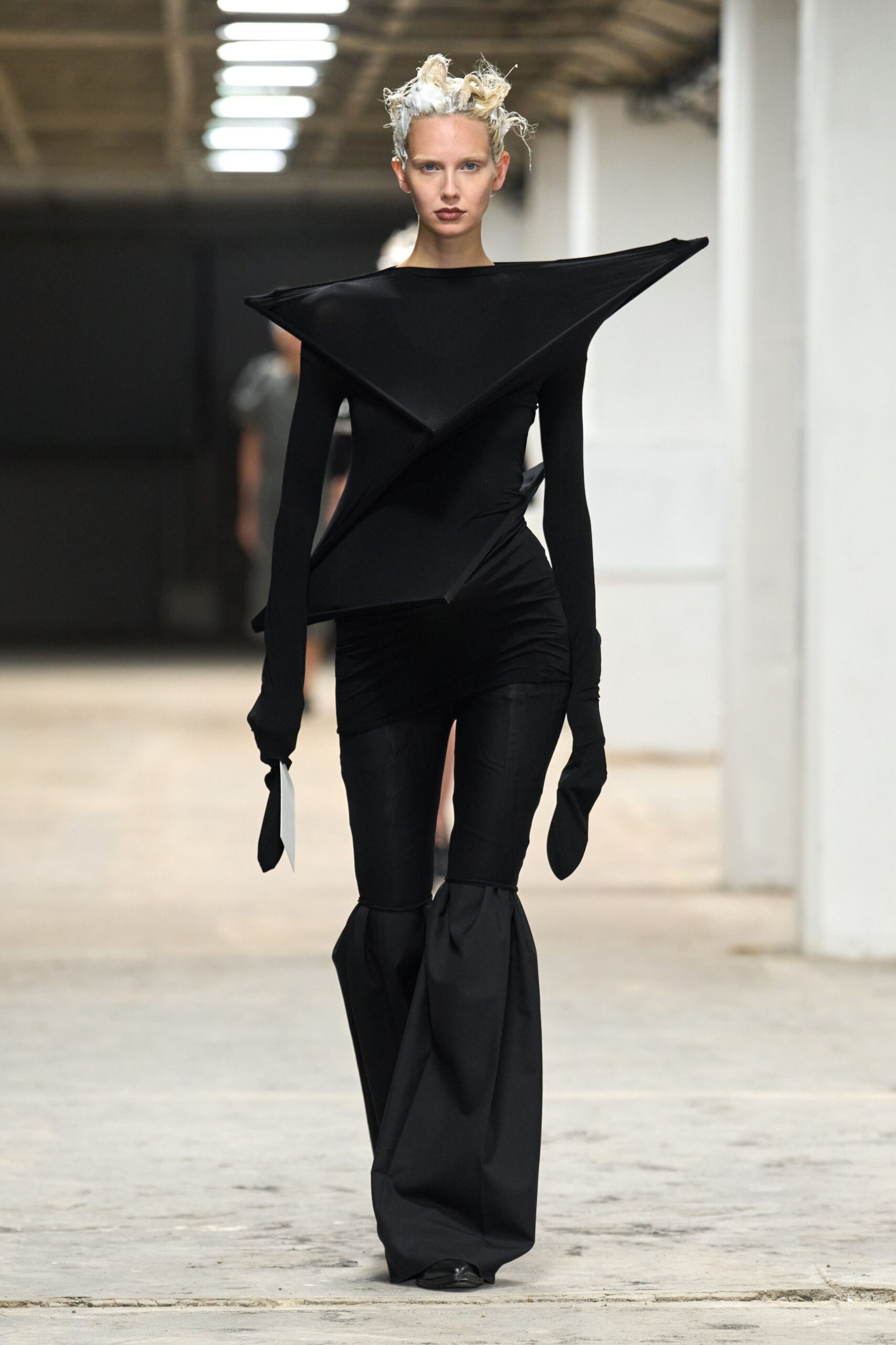 black fitted jumpsuit with gloves