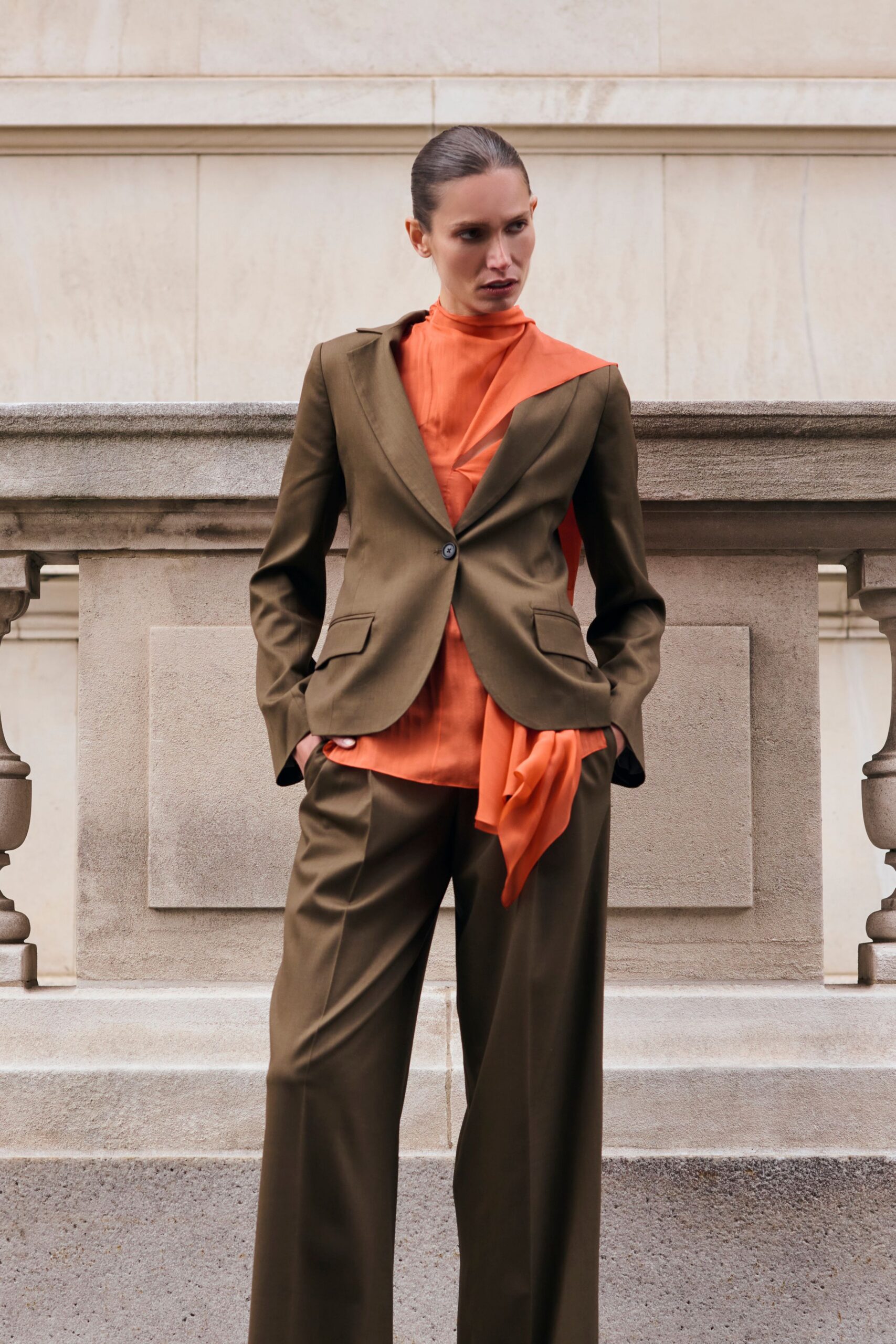orange long-sleeve high-neck fitted top