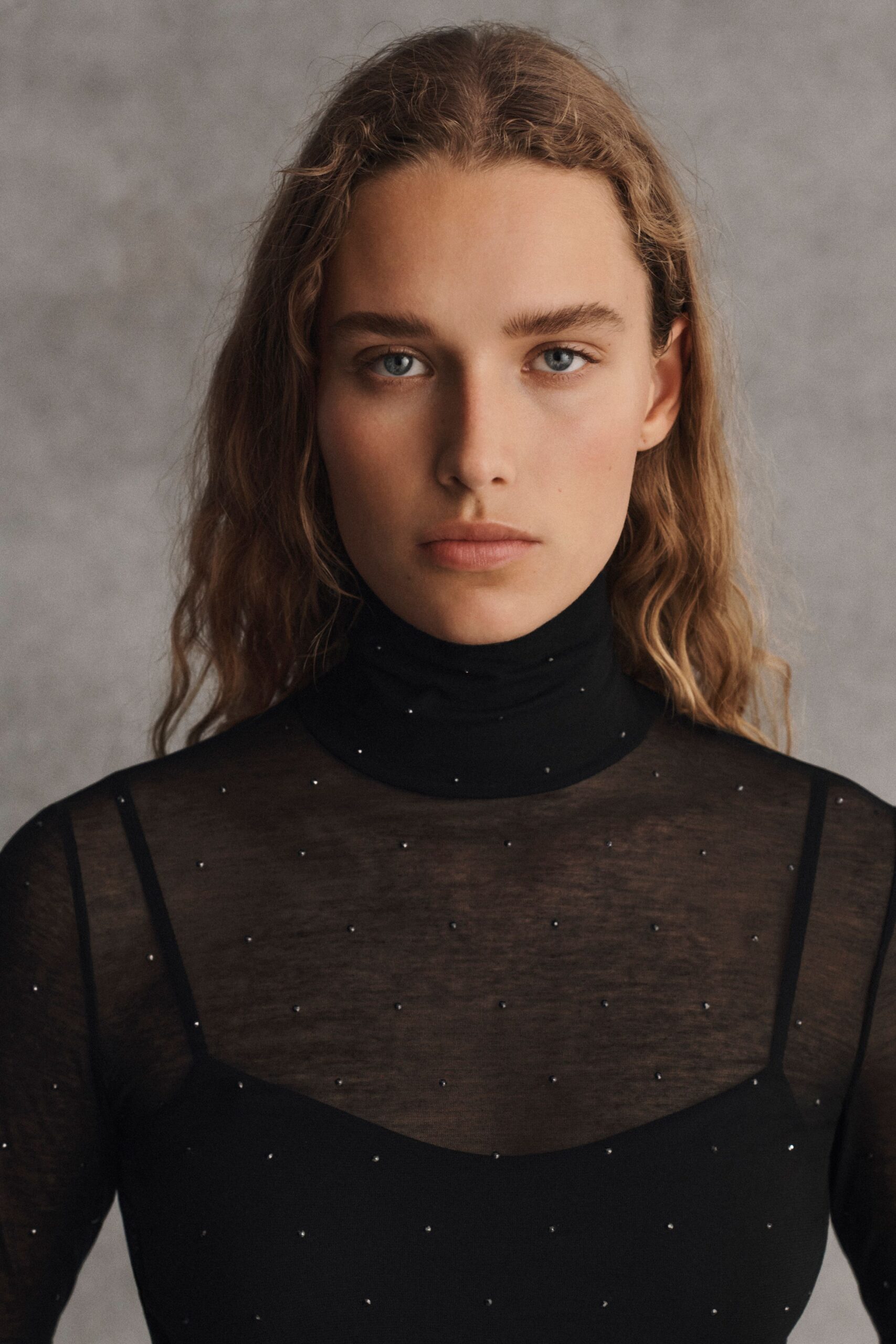 black fitted sheer top