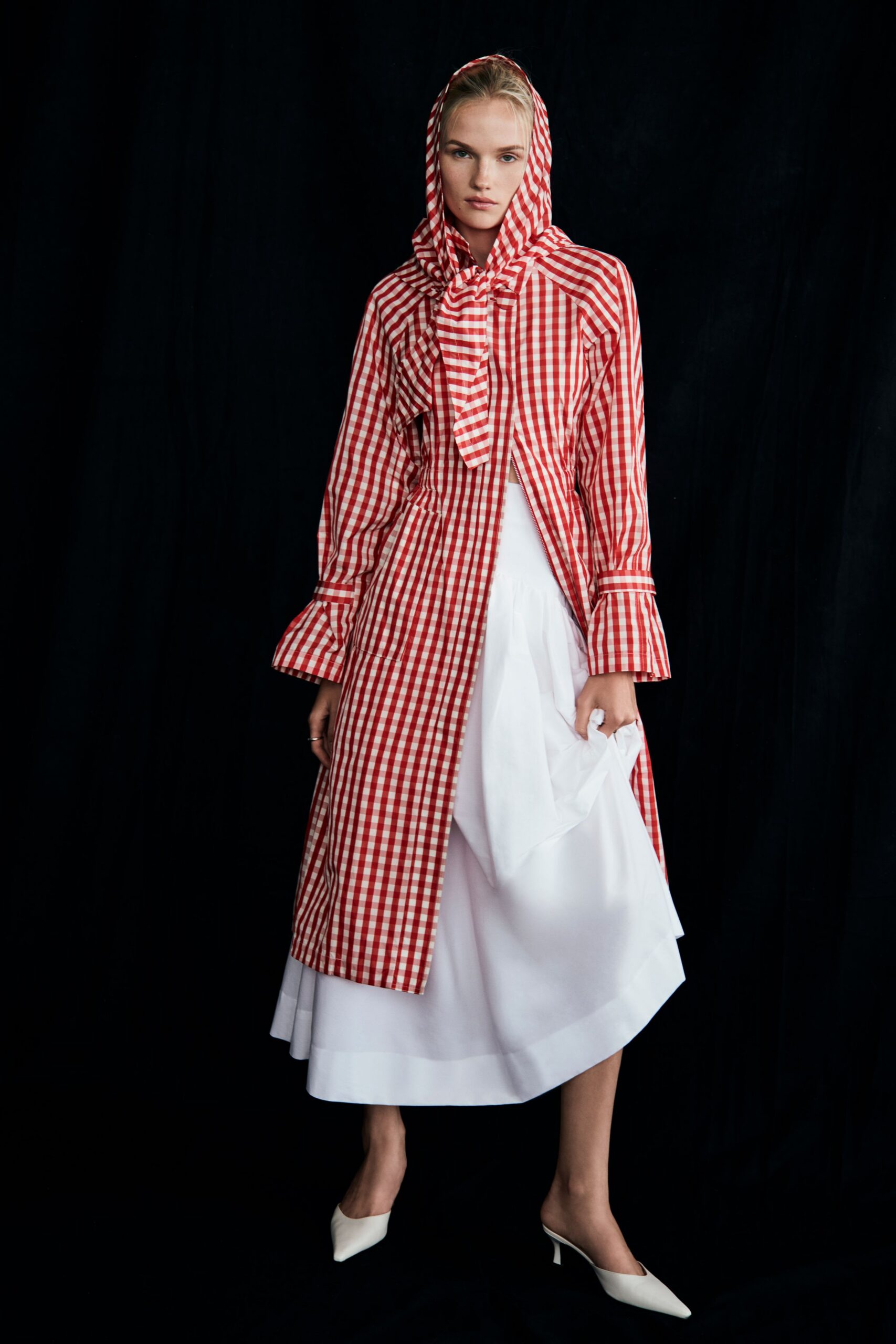 red and white checked coat with white dress
