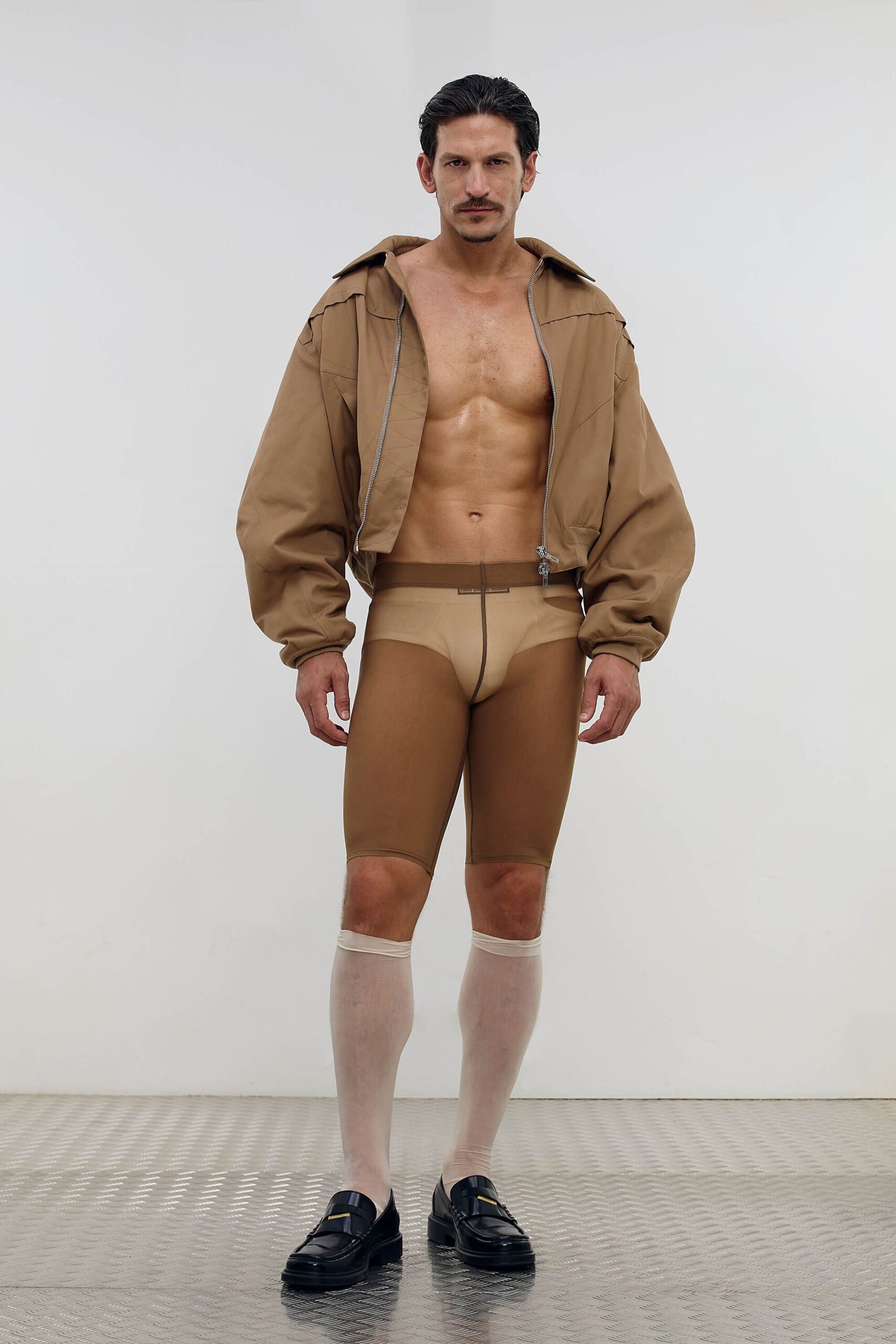 brown relaxed jacket and beige bodysuit