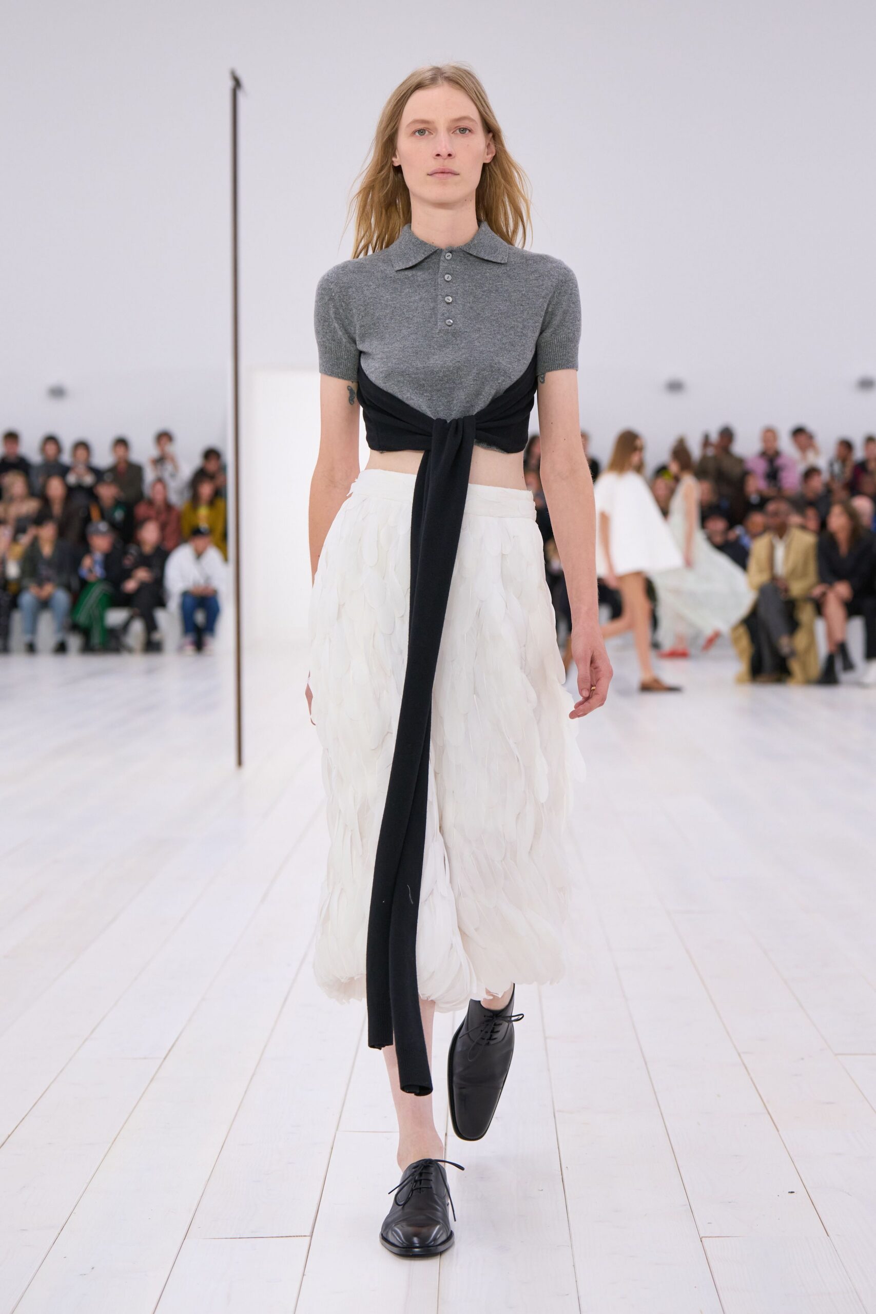 gray fitted top white pleated skirt
