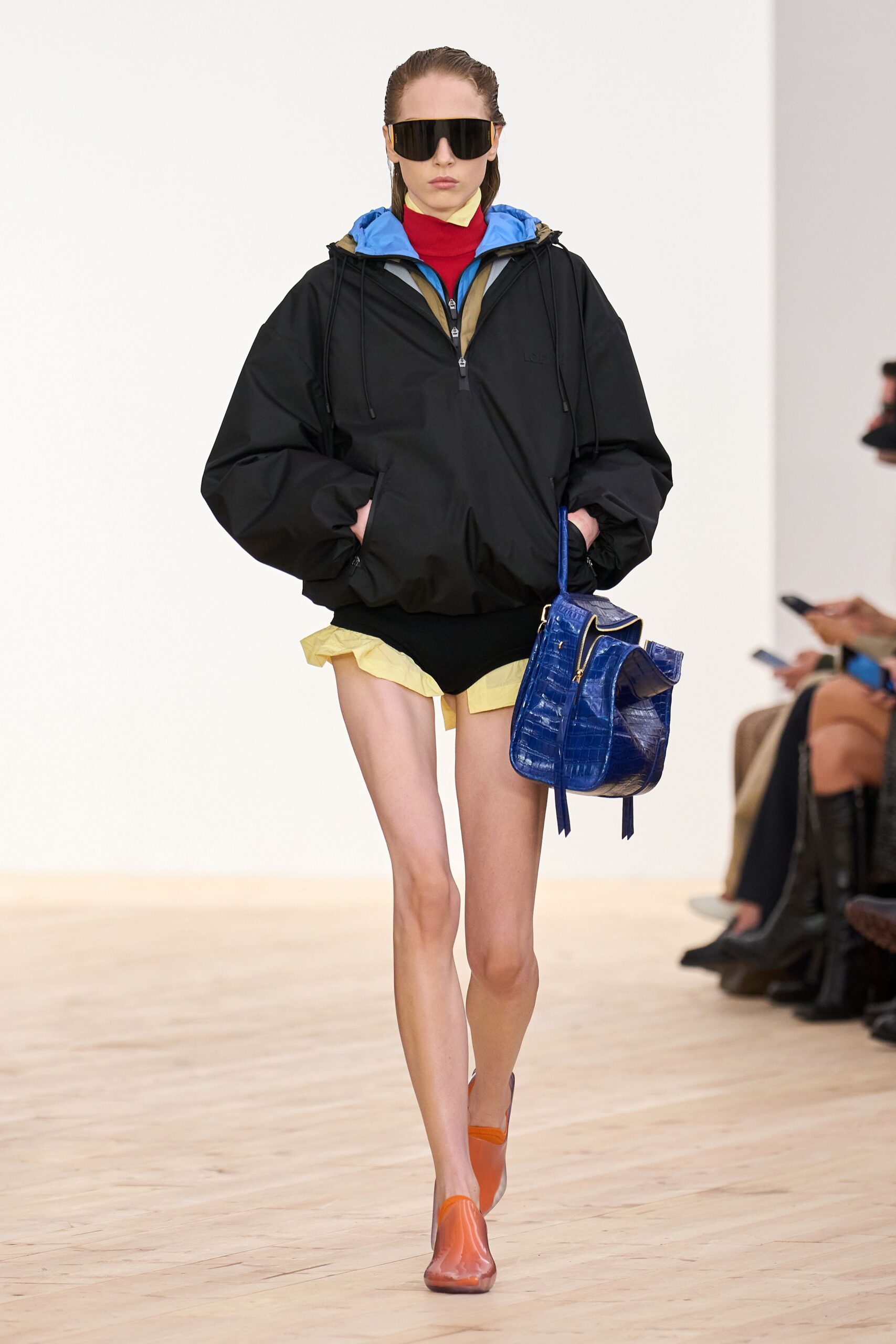 black relaxed jacket with blue hoodie