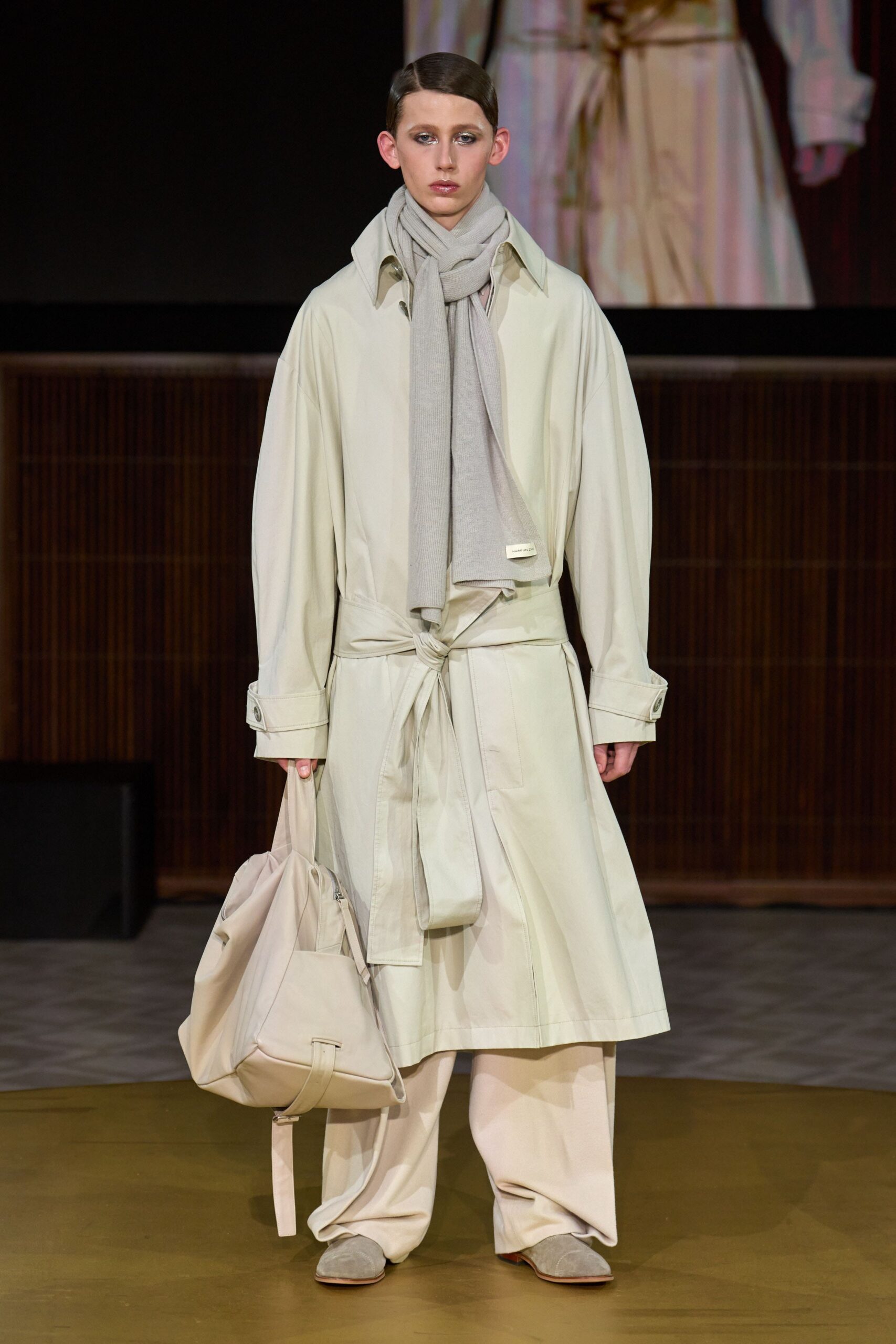 beige trench coat with gray scarf