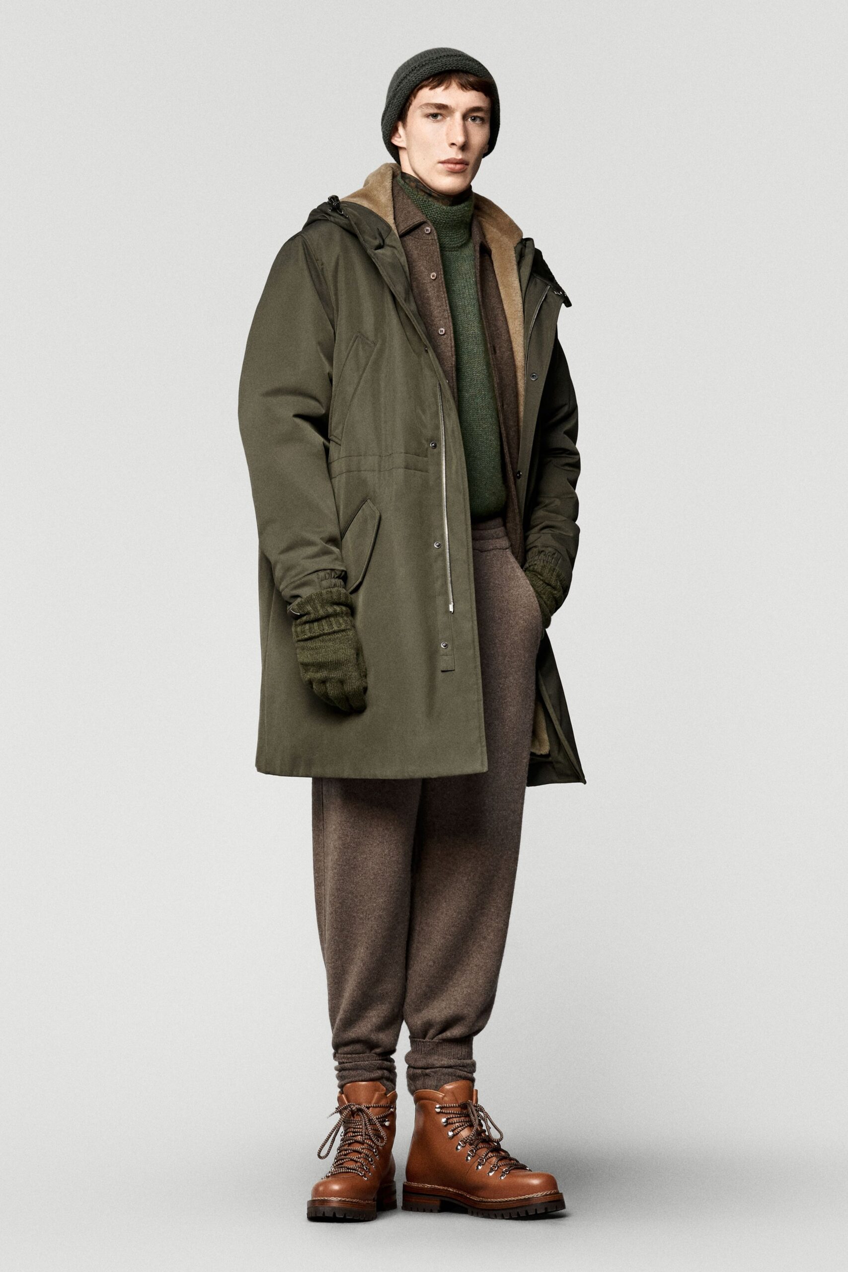 green parka with sweater and boots