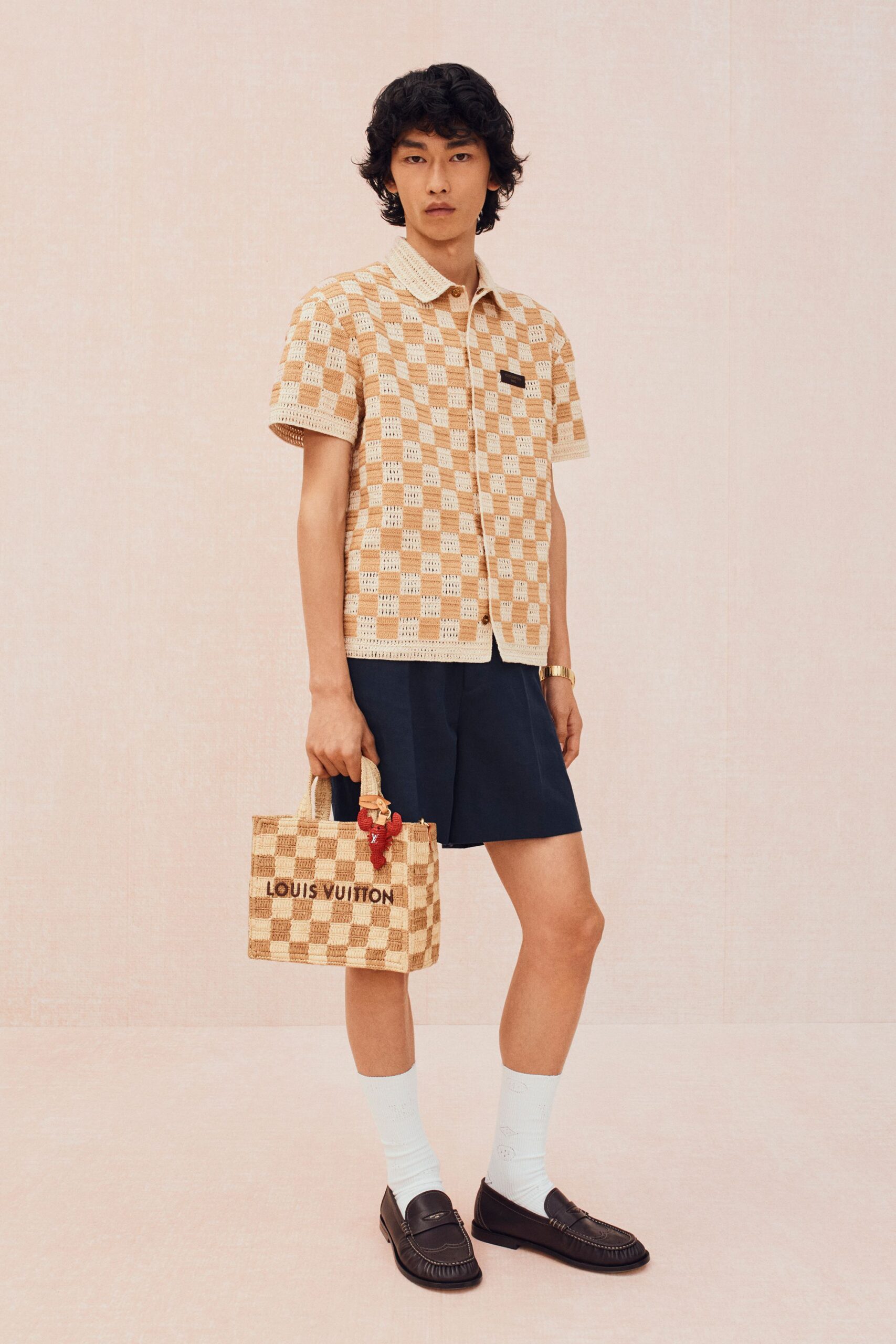 beige checked shirt with navy shorts