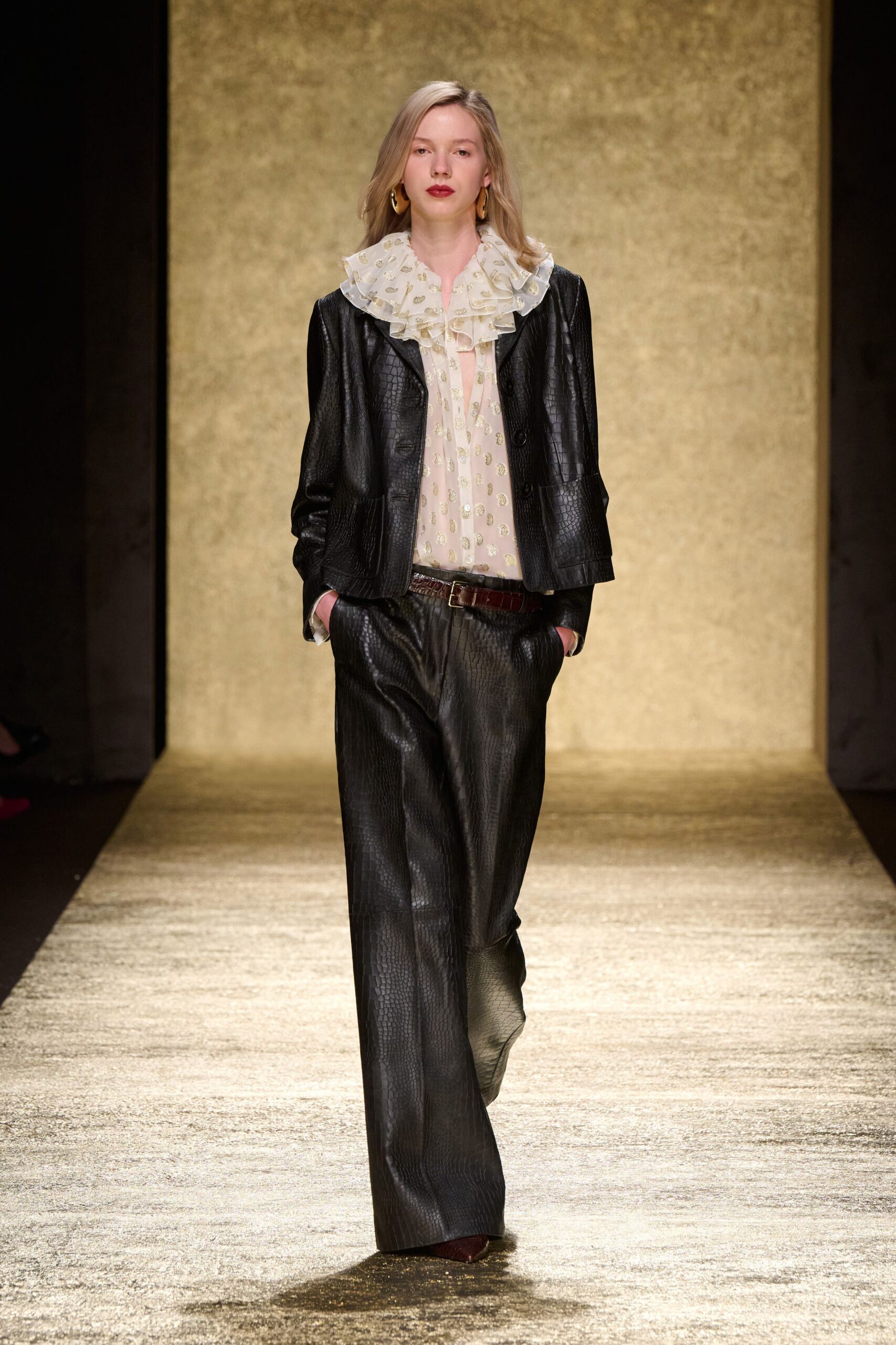 black leather jacket with white blouse