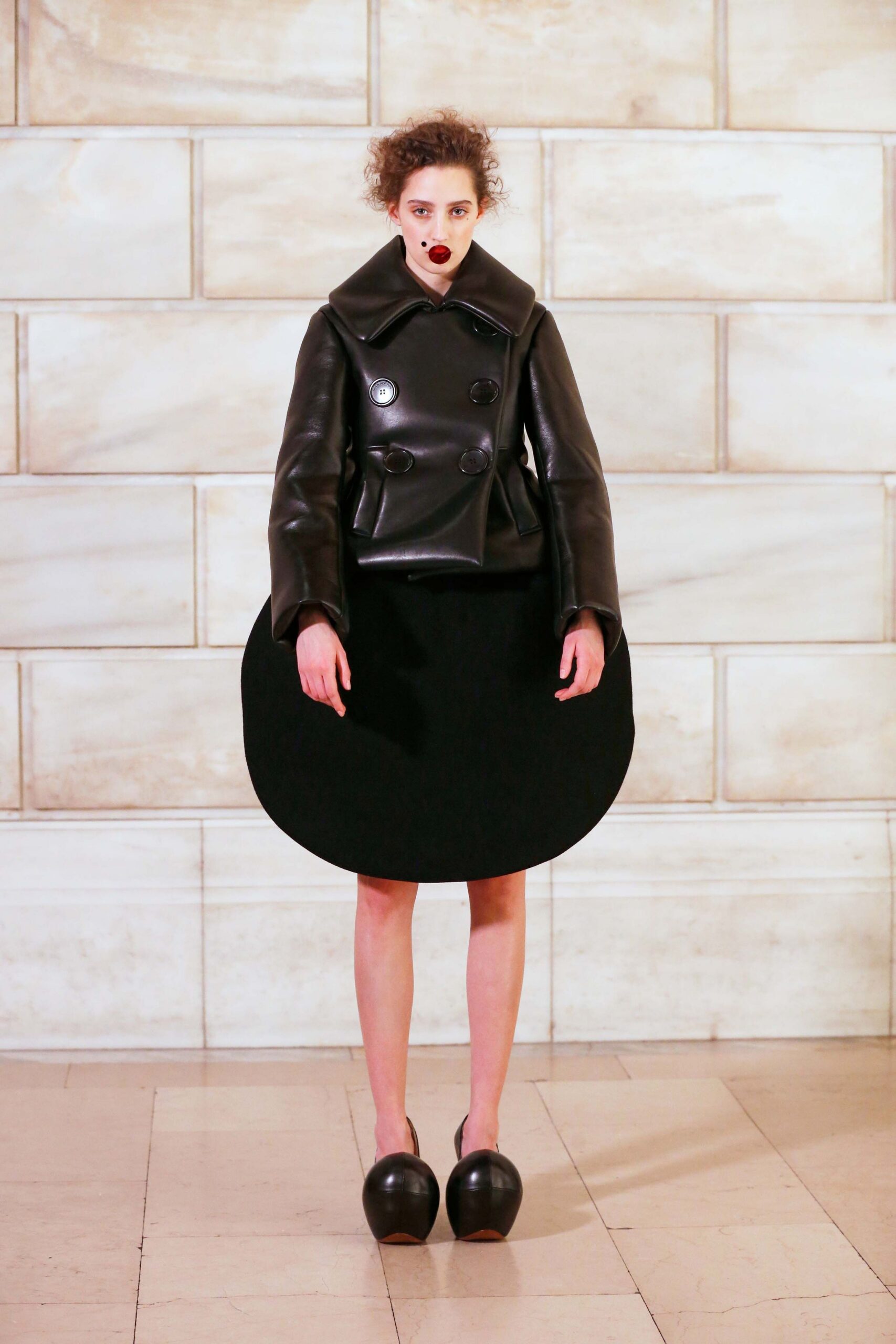 black leather long-sleeve double-breasted structured coat