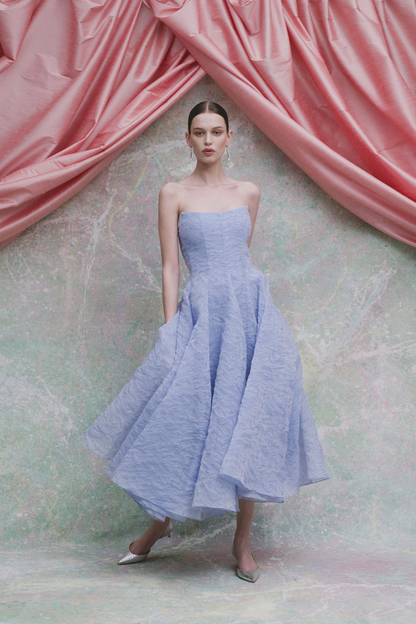 blue silk strapless fitted pleated flowing midi gown