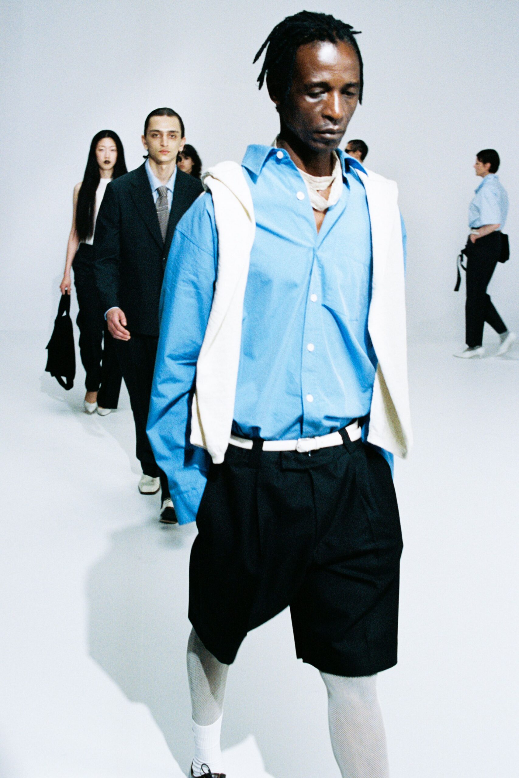 blue cotton shirt with white hoodie
