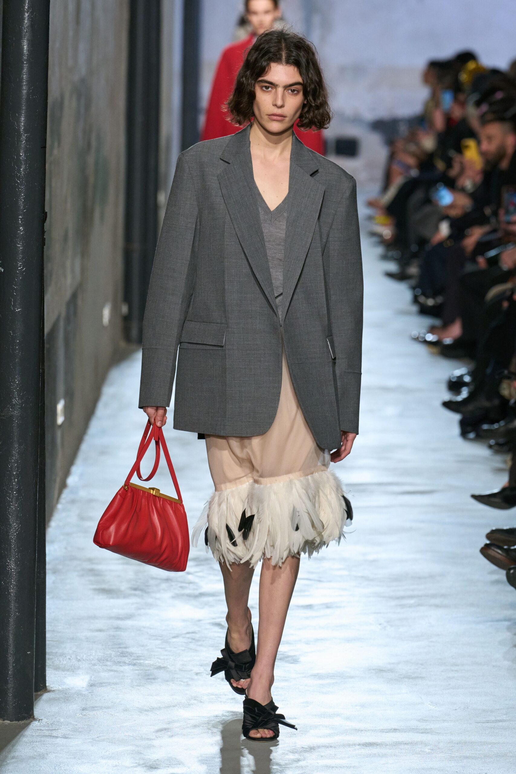gray tailored blazer with beige pleated skirt