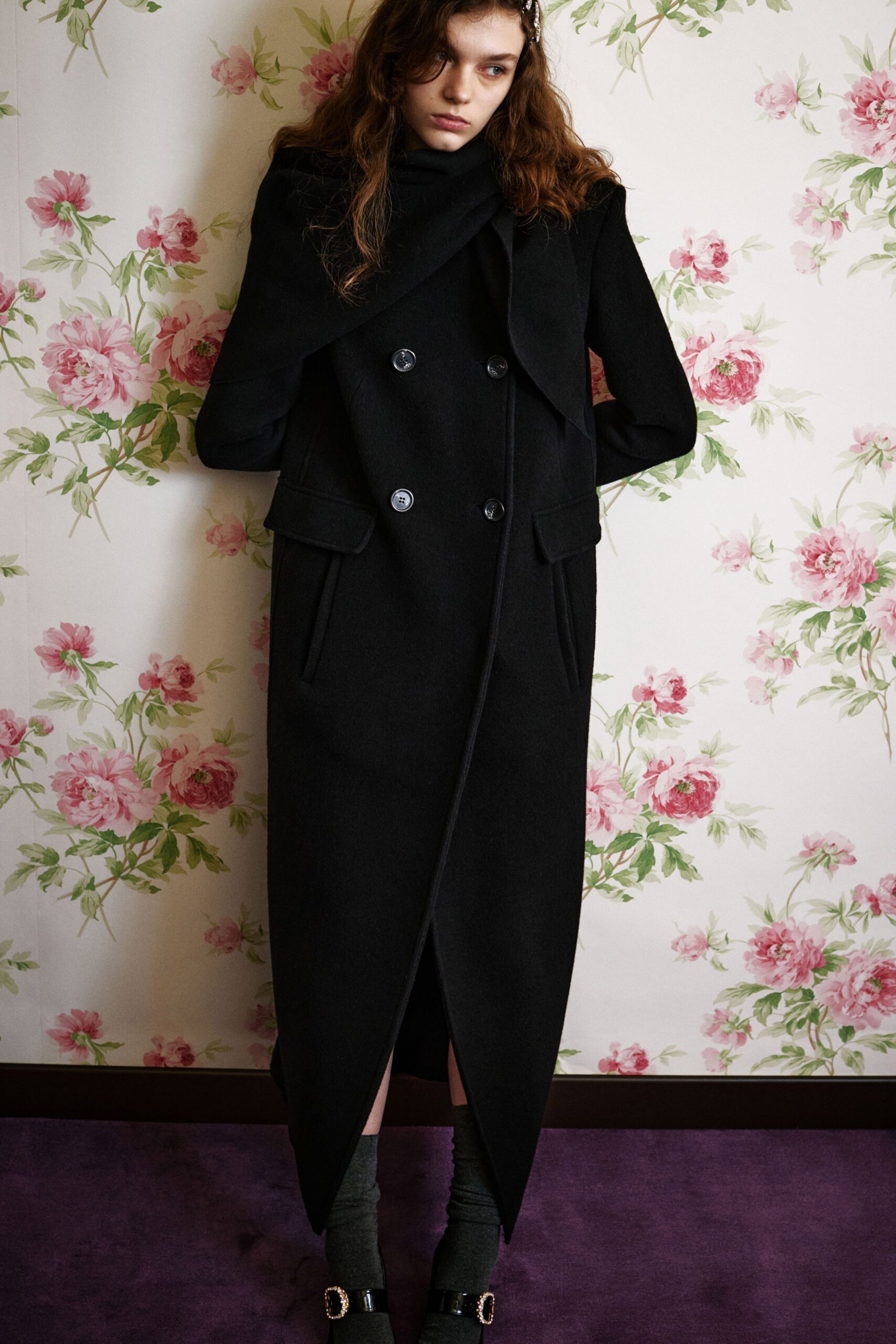 black wool coat with embellished shoes