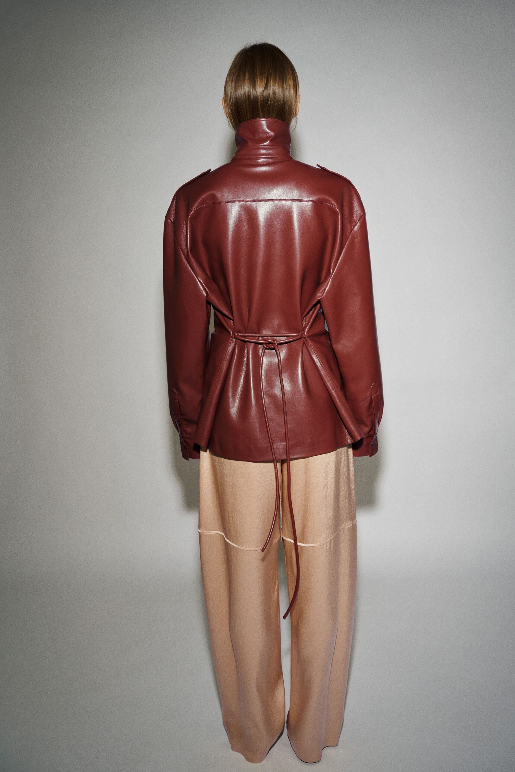 brown leather long-sleeve collared relaxed zippered belted jacket