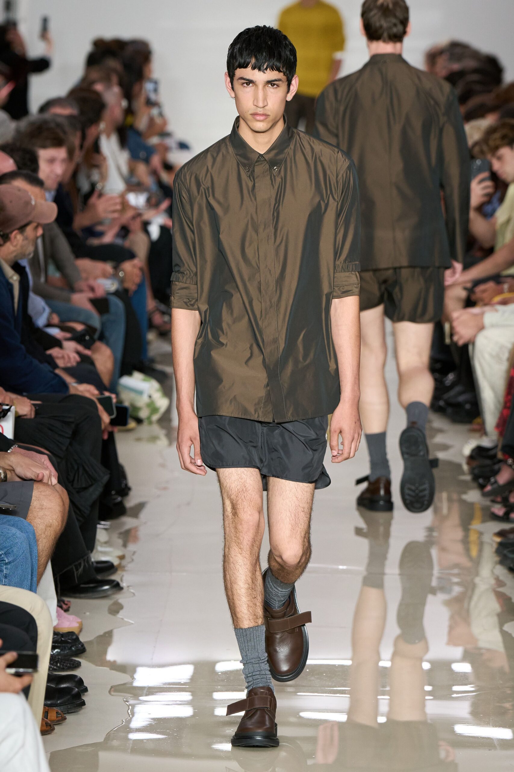 brown cotton shirt with black shorts