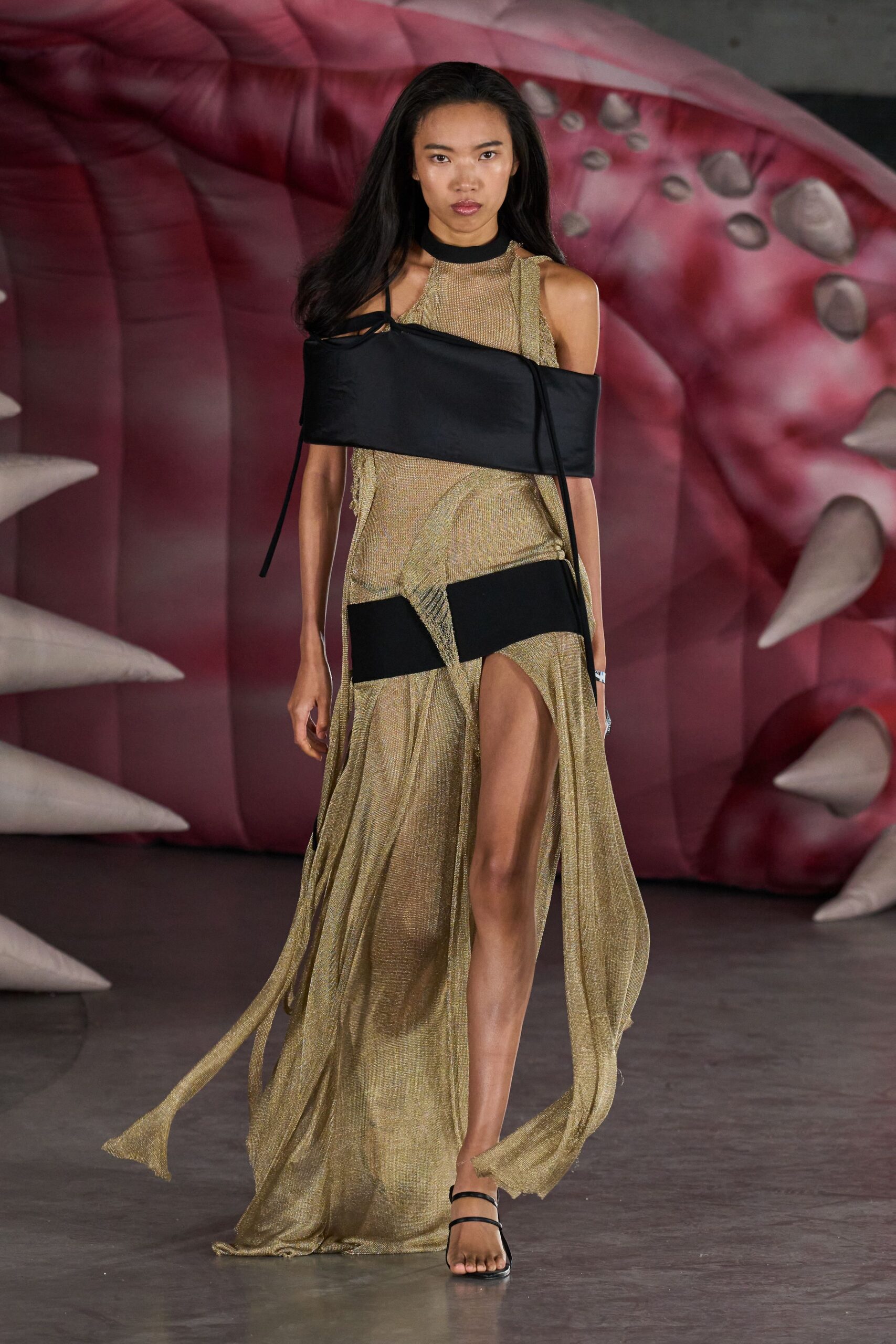 gold silk sleeveless high-neck fitted draped flowing dress
