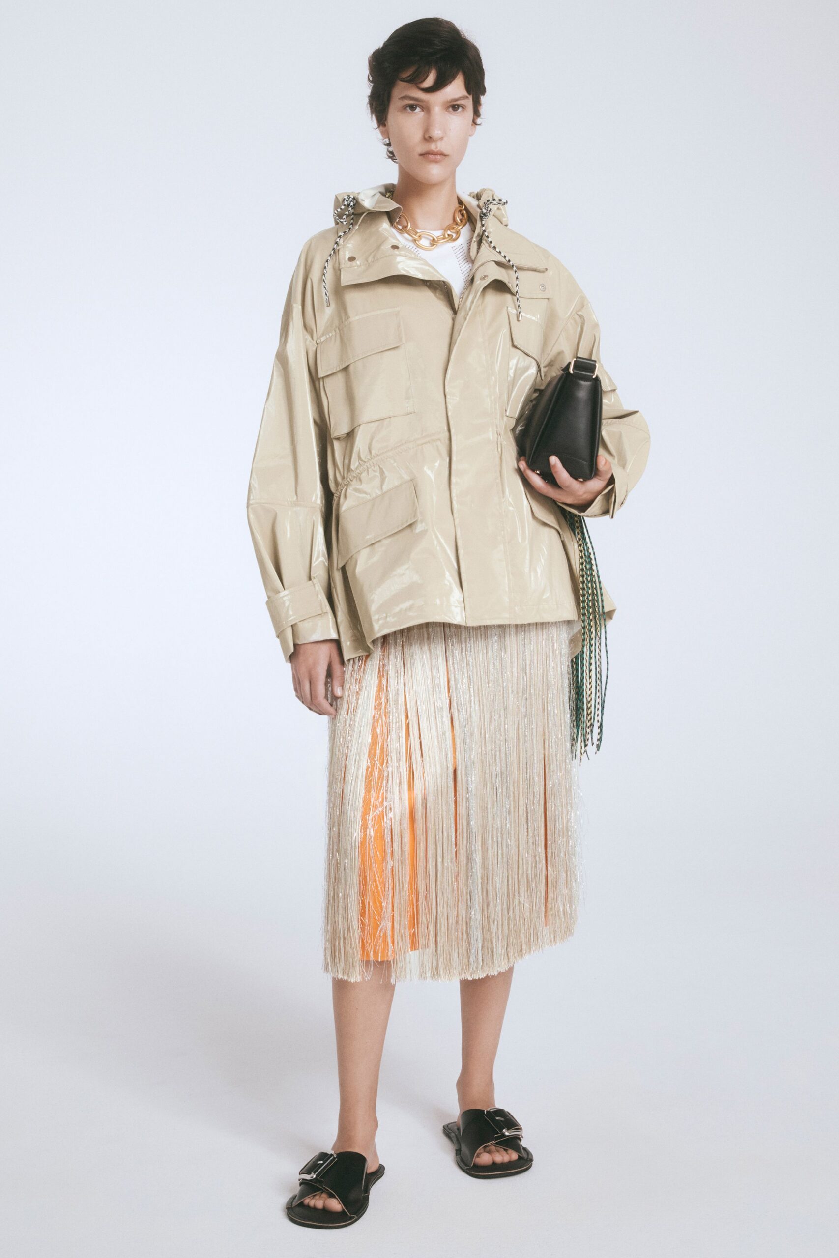 beige vinyl long-sleeve collared relaxed zippered pockets jacket