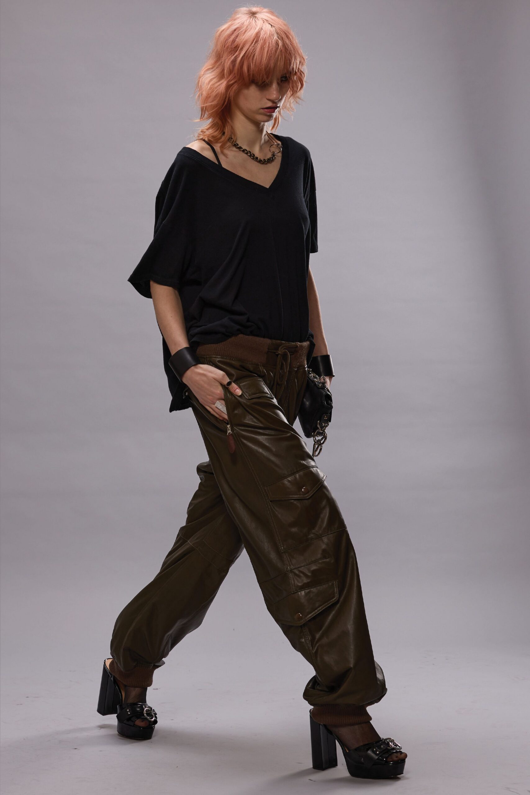 black relaxed top with brown cargo pants