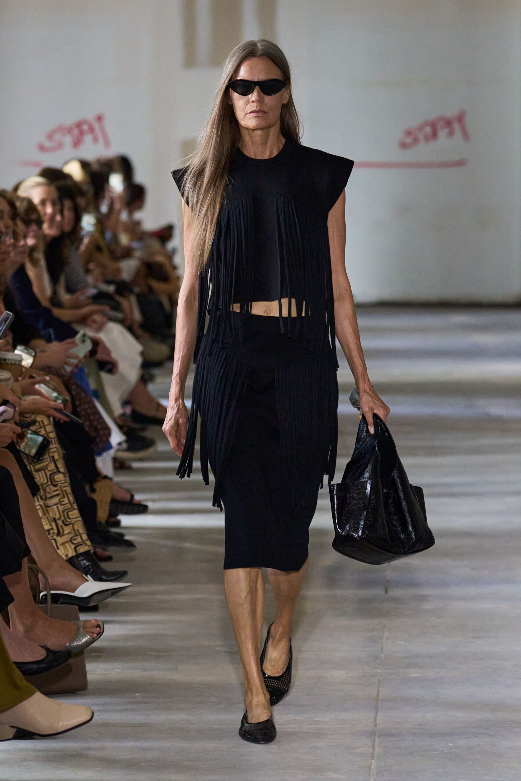 black fringed top and pencil skirt