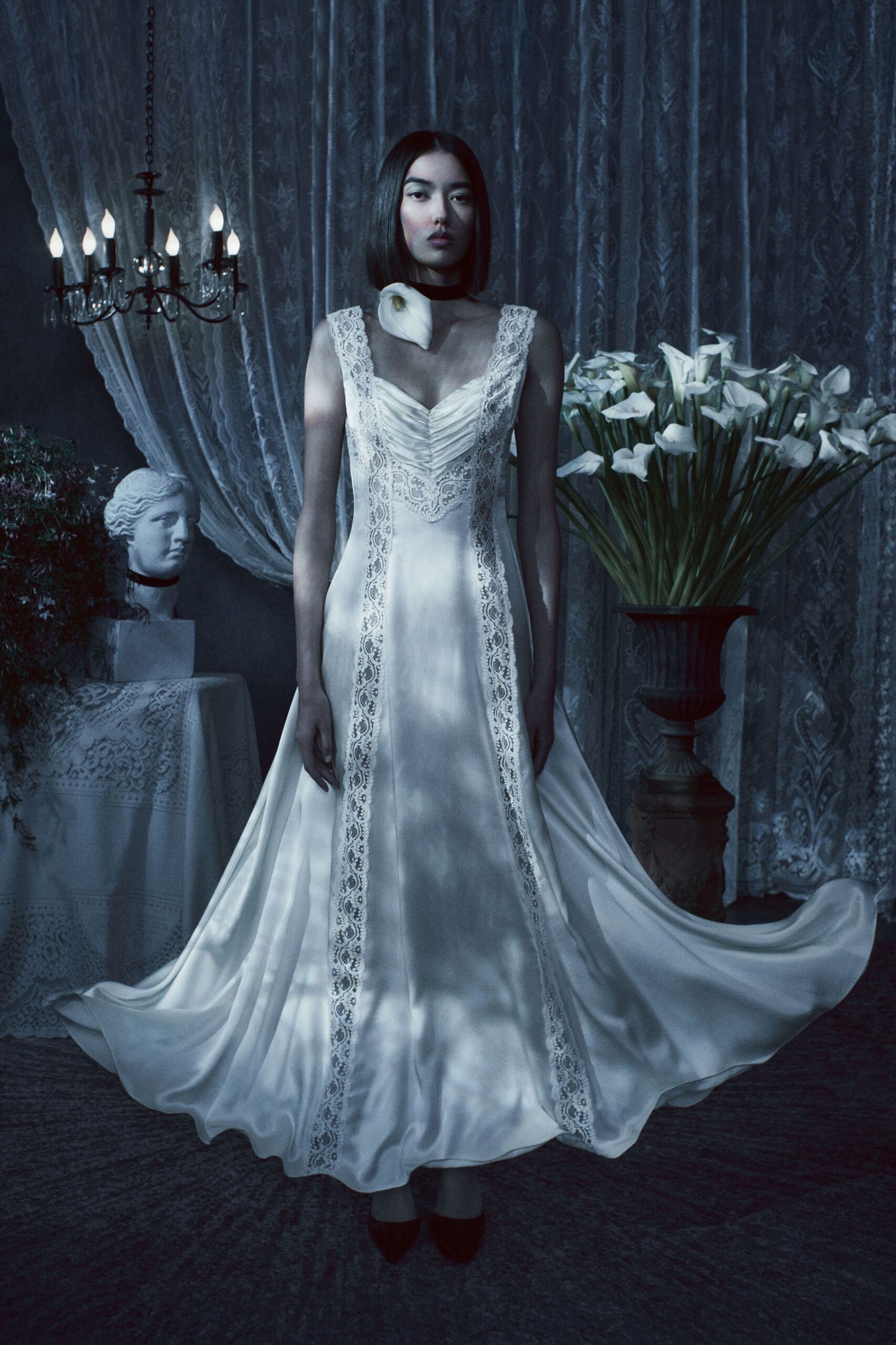 white silk sleeveless v-neck fitted pleated layered gown