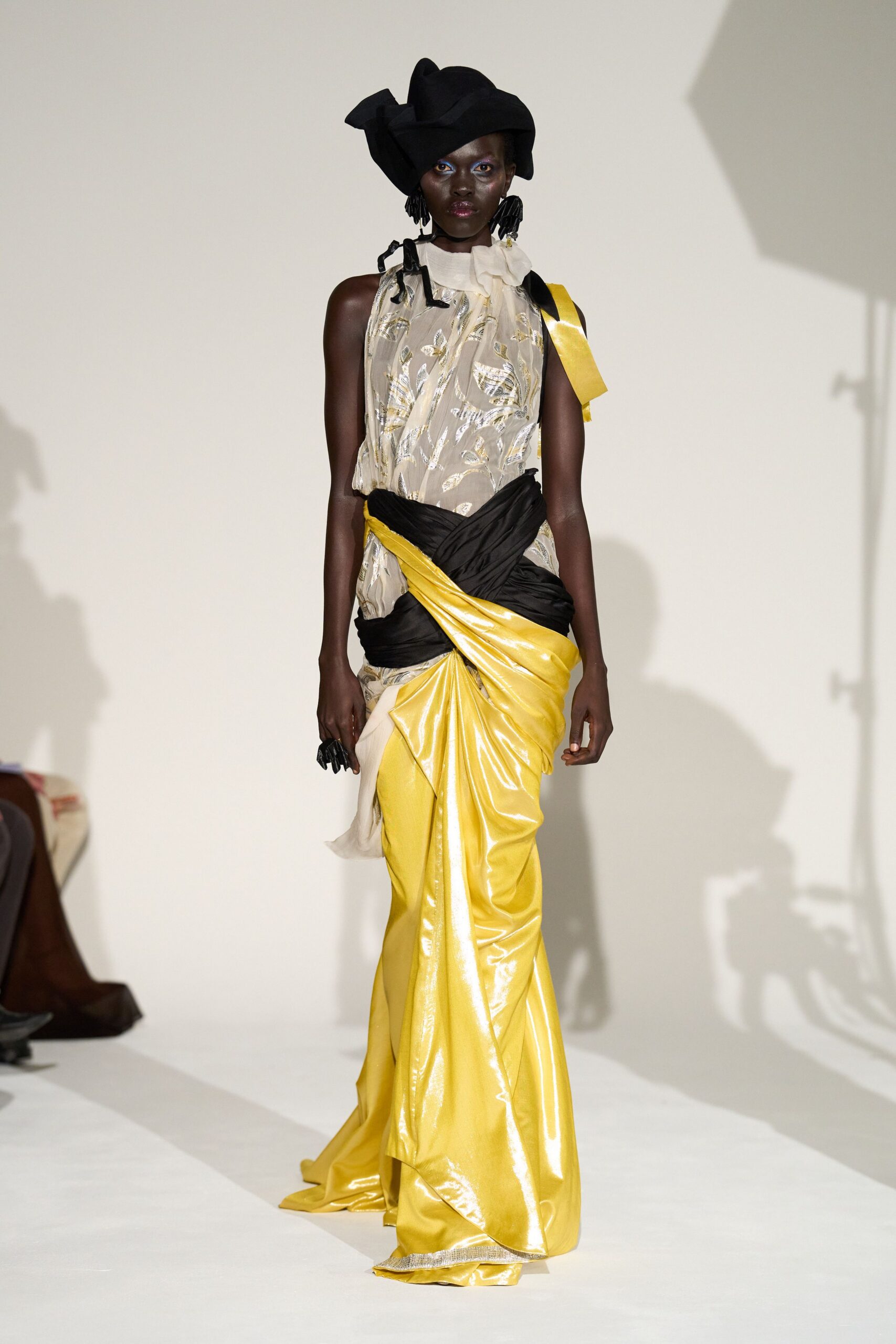 yellow silk sleeveless high-neck fitted draped layered gown