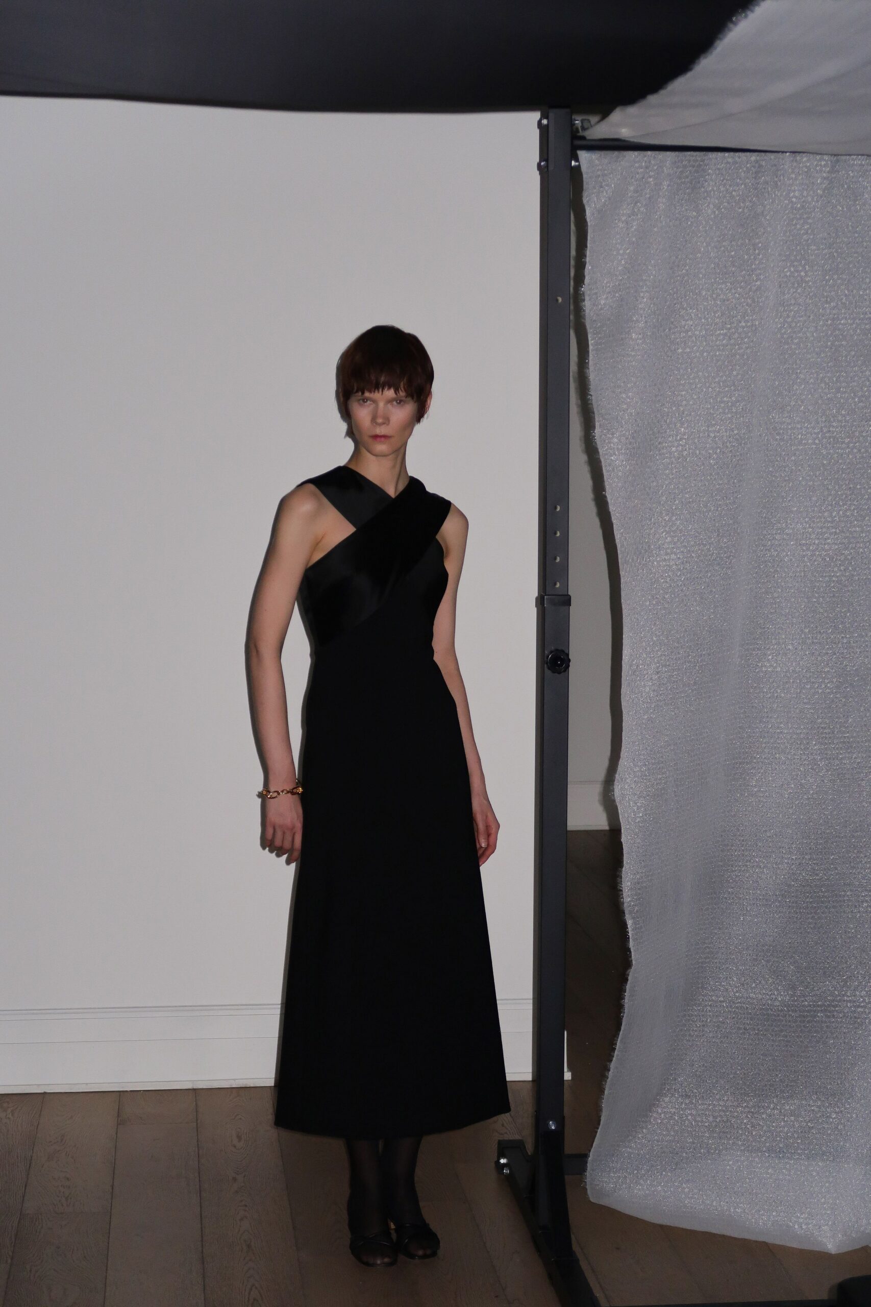 black silk sleeveless gown