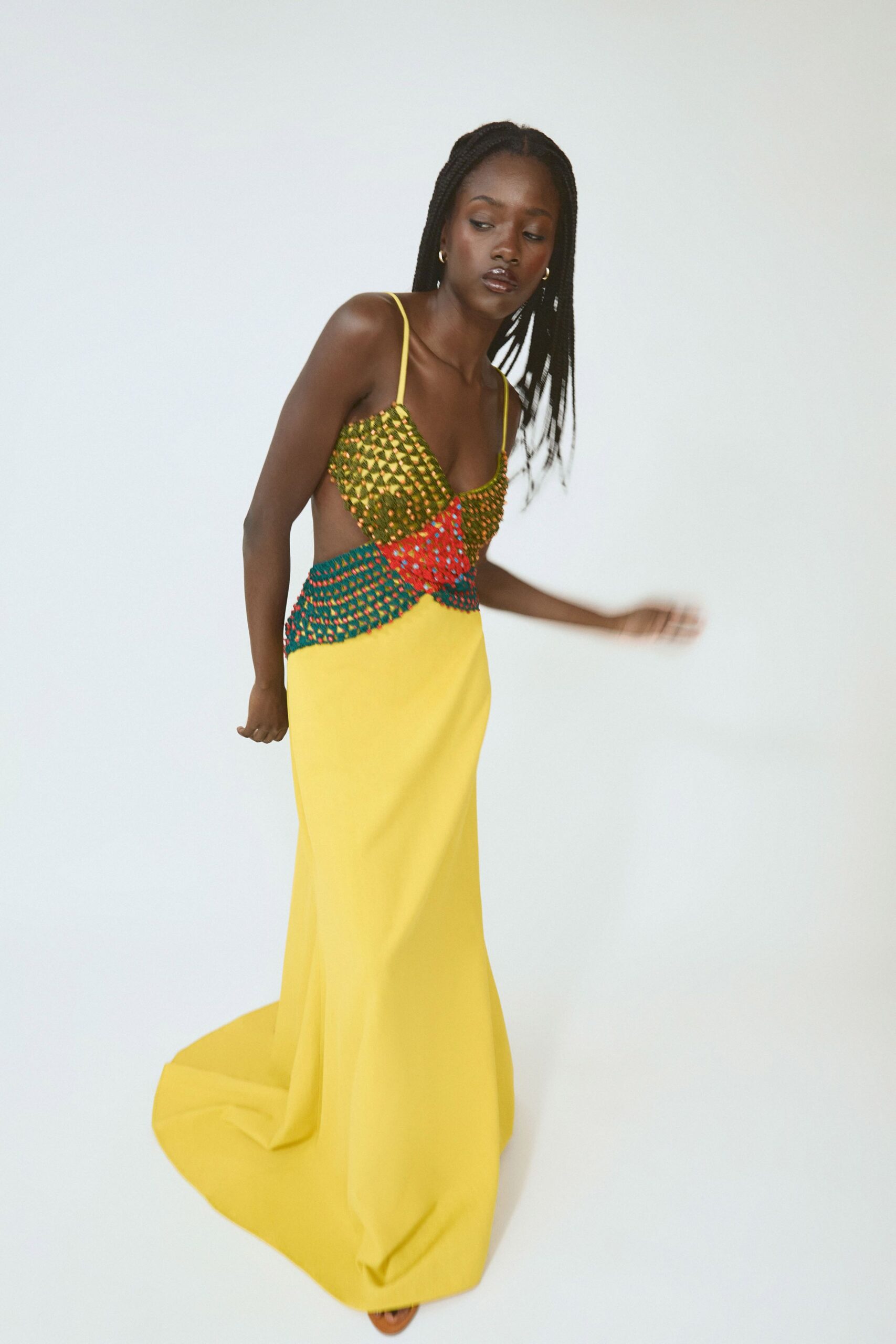 yellow cotton sleeveless v-neck fitted pleated maxi gown