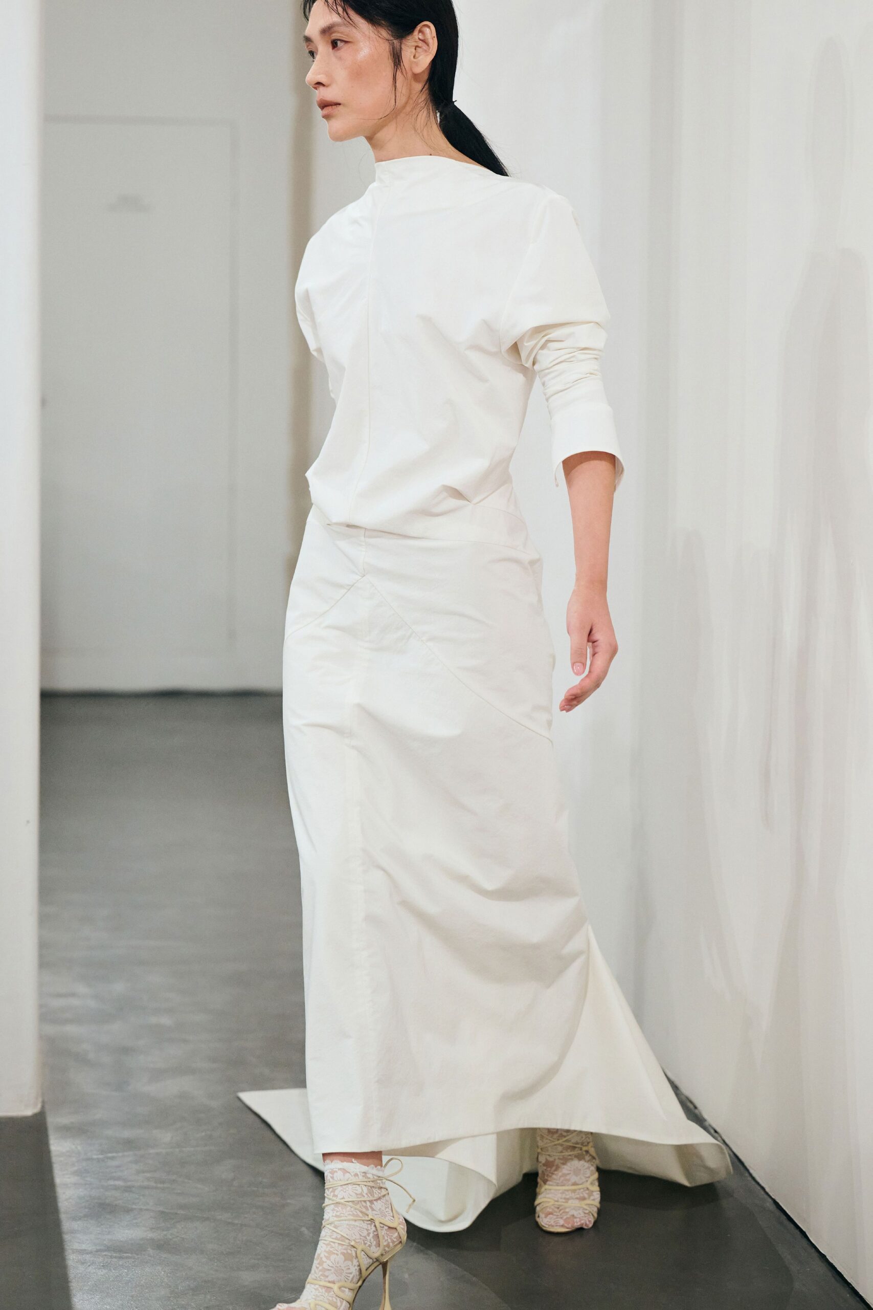 white cotton long-sleeve high-neck fitted buttoned top