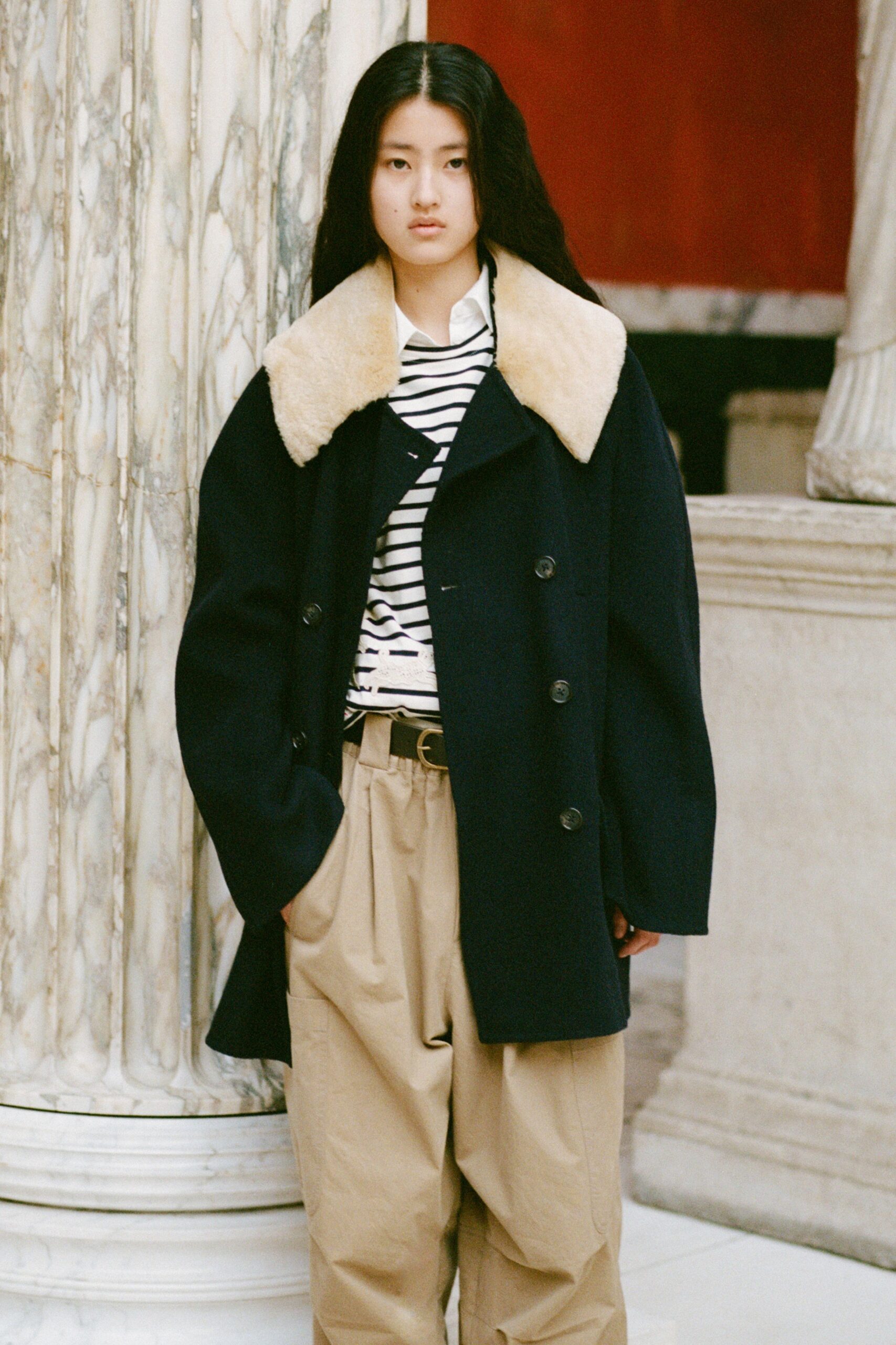 black wool coat with striped shirt
