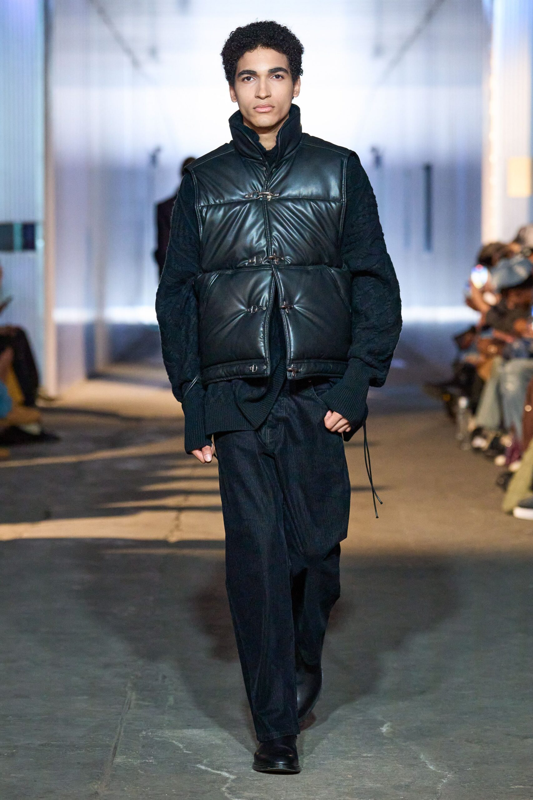 black leather vest and sweater