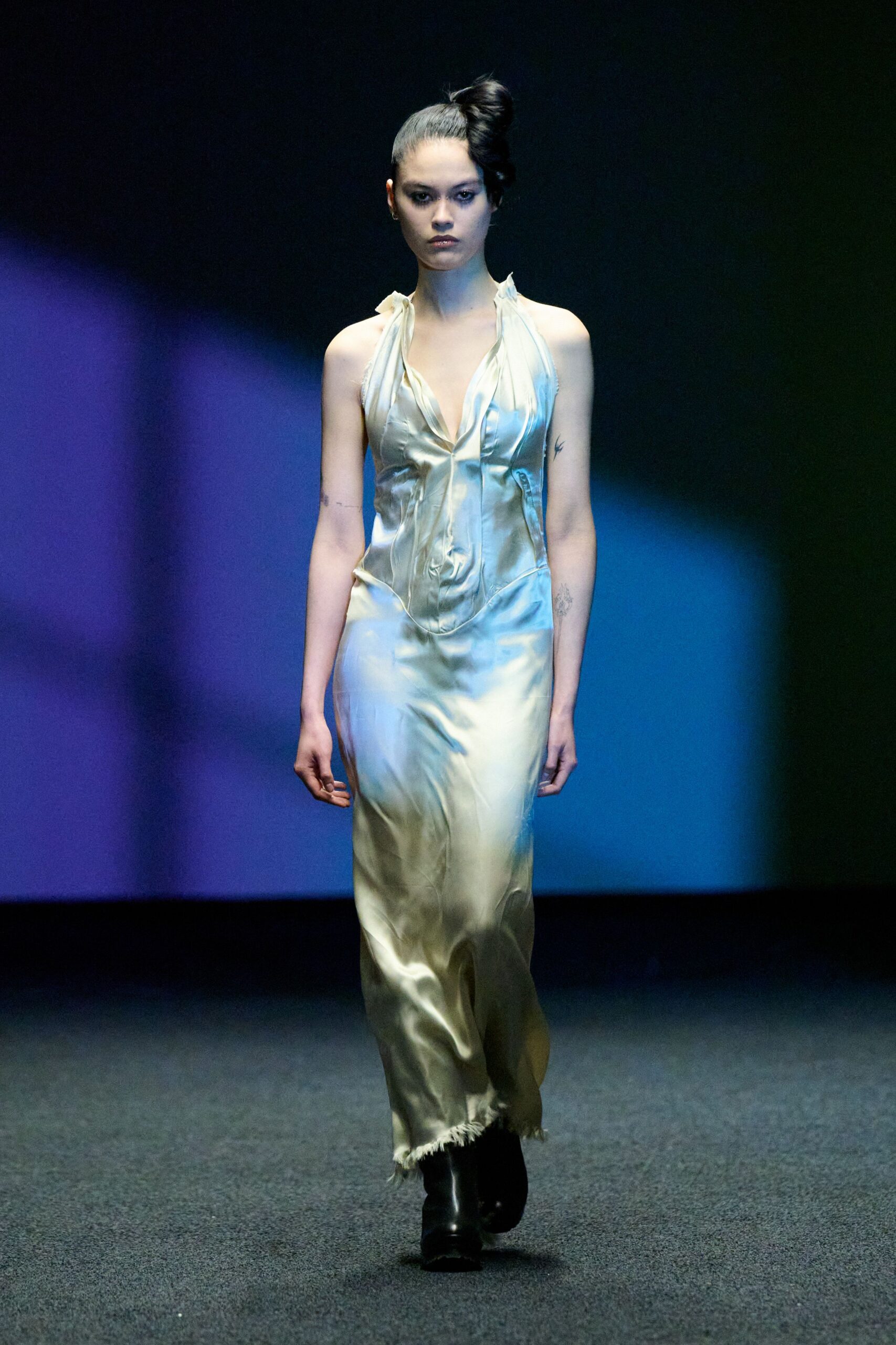 gold silk sleeveless gown with fringes