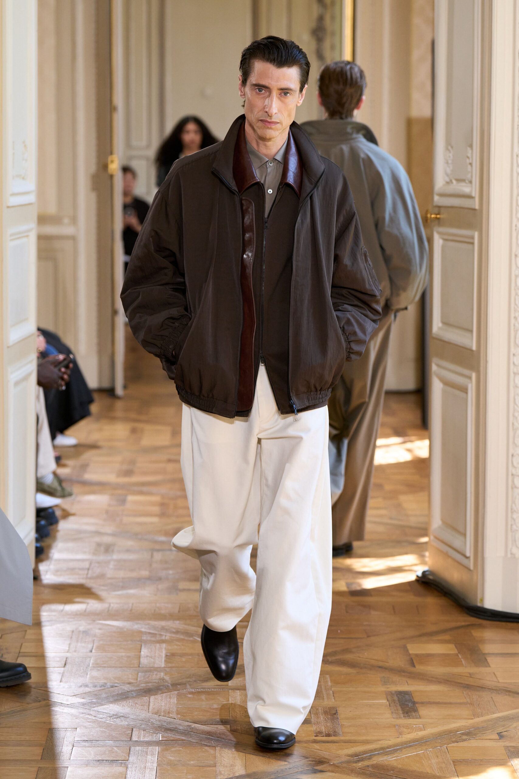 brown leather jacket with gray shirt