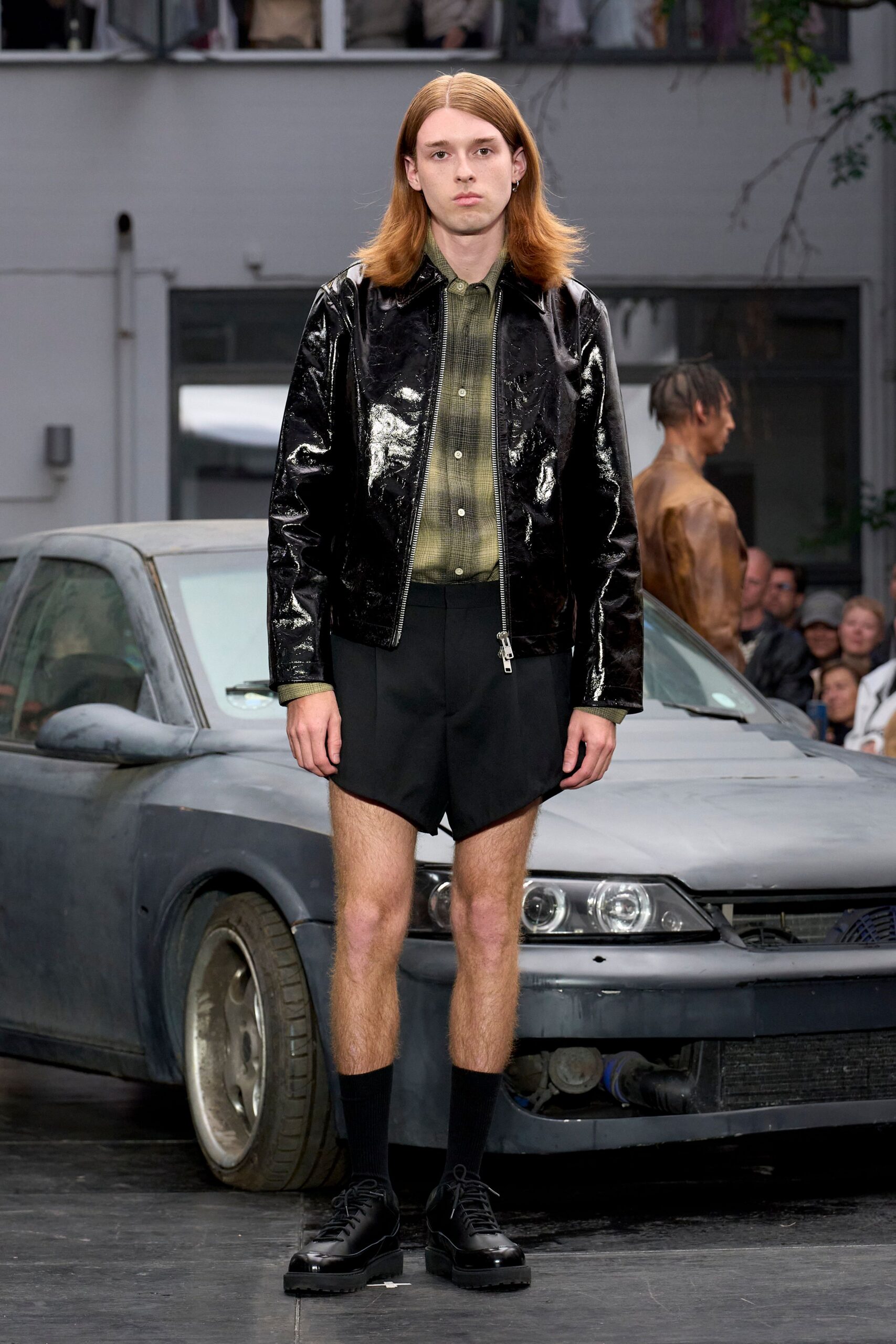 black vinyl long-sleeve collared fitted shiny jacket