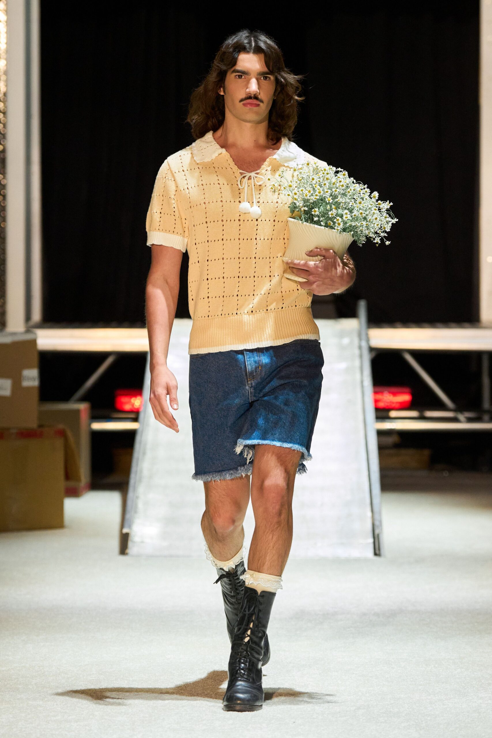 yellow knitted top with denim shorts