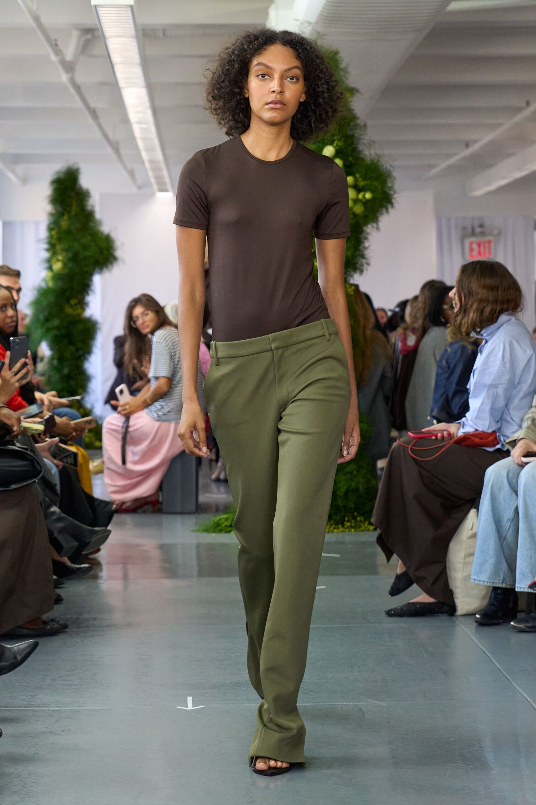 brown fitted top green tailored pants