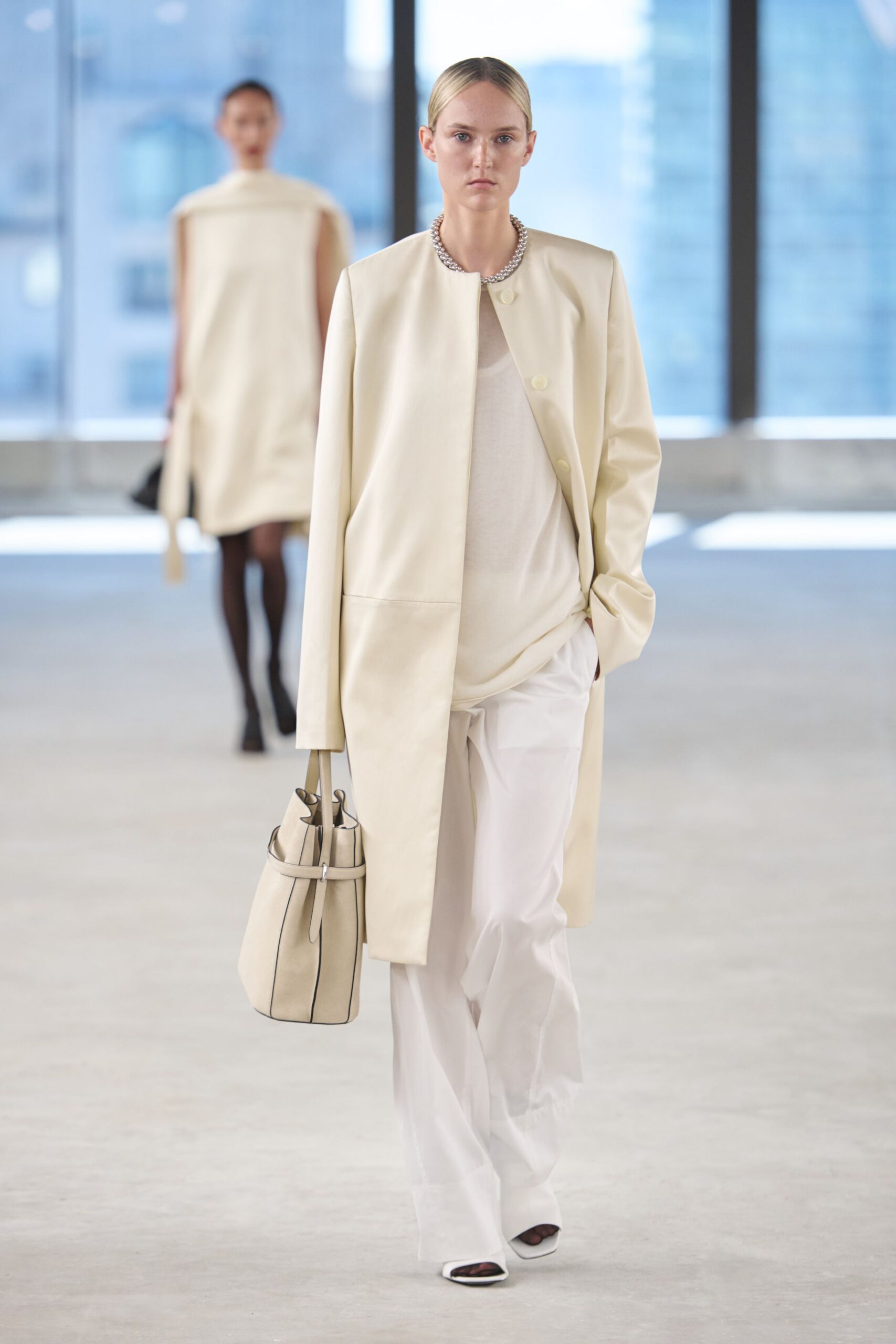 white leather coat with relaxed fit